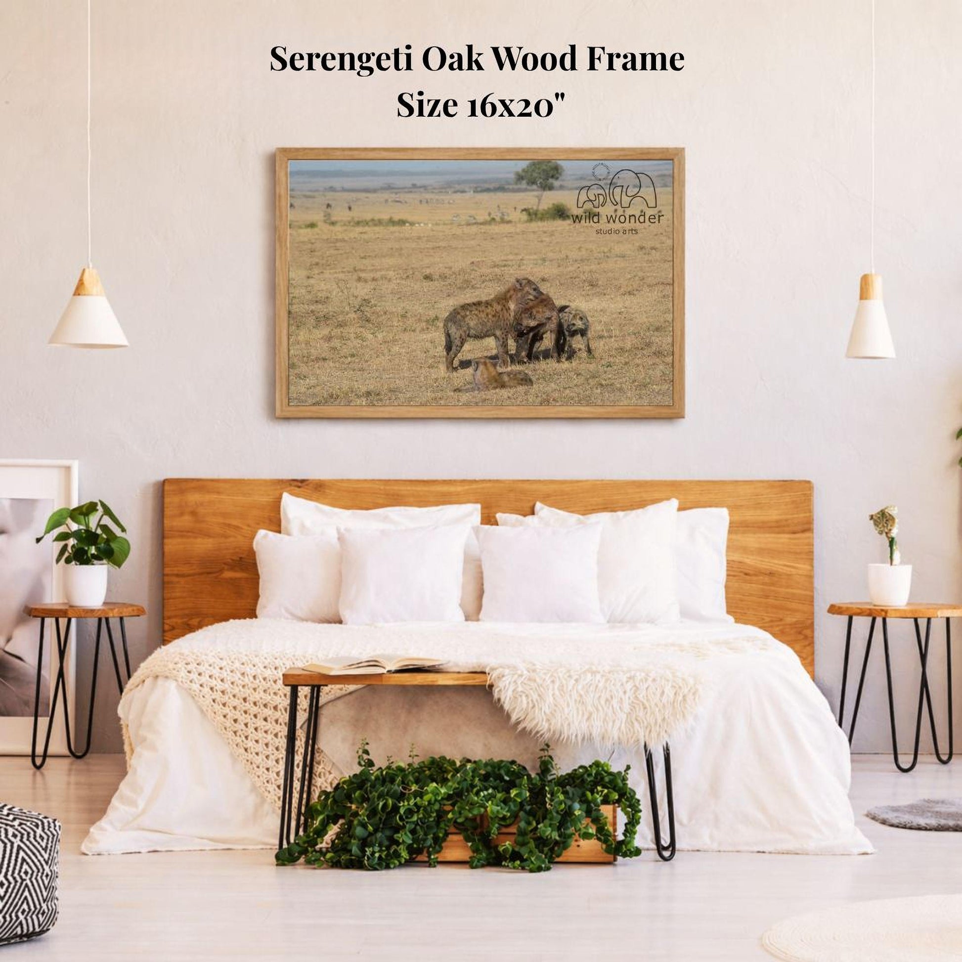 a serene bedroom scene with a large framed picture of a serene oak wood frame hanging on the wall above a bed with white bedding.