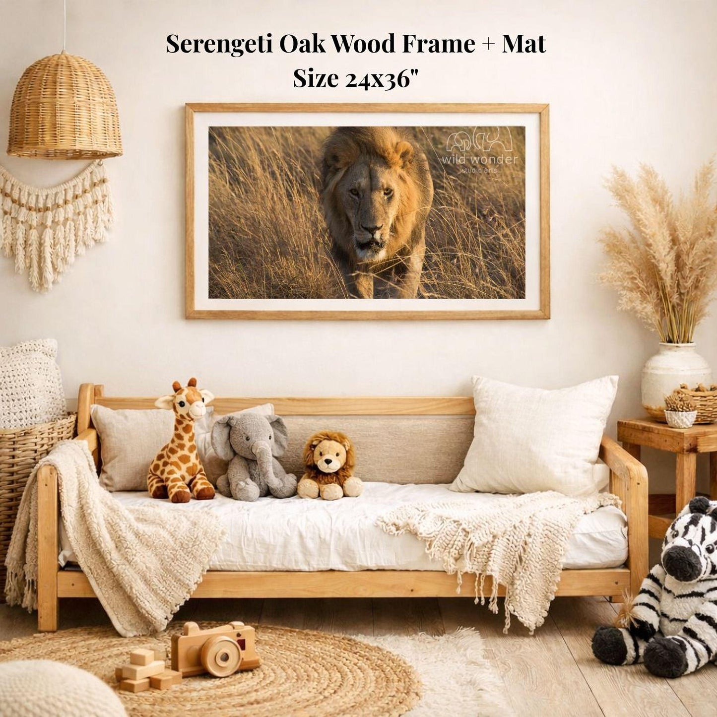 a serene indoor setting with a wooden frame and mat hanging on a wall, displaying a photograph of a lion in a grassy field. The room is decorated with various stuffed animals, including a giraffe, elephant, lion, and zebra, arranged on a couch and a rug. The overall atmosphere of the room is cozy and inviting, with a harmonious blend of natural and playful elements.