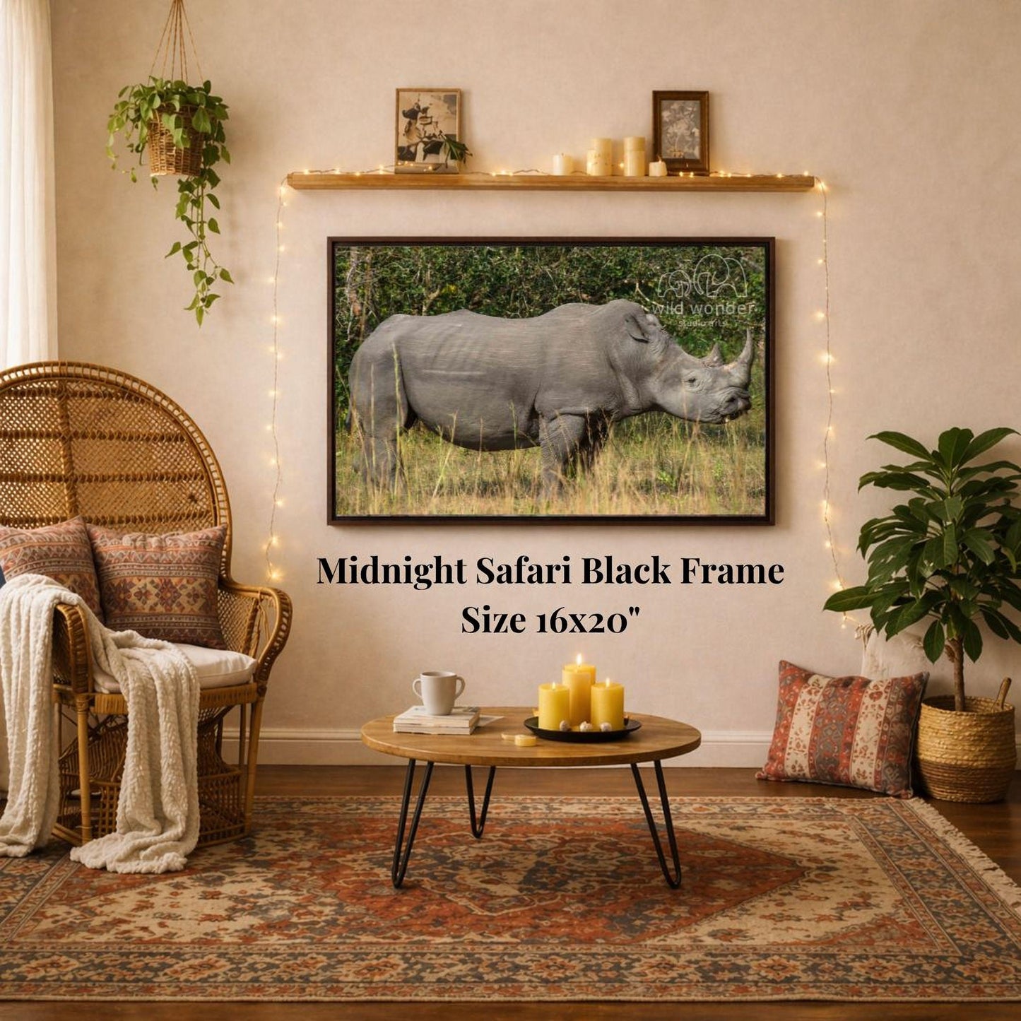 a living room with a large framed photograph of a rhinoceros on the wall, a wicker chair, a coffee table, and a potted plant.