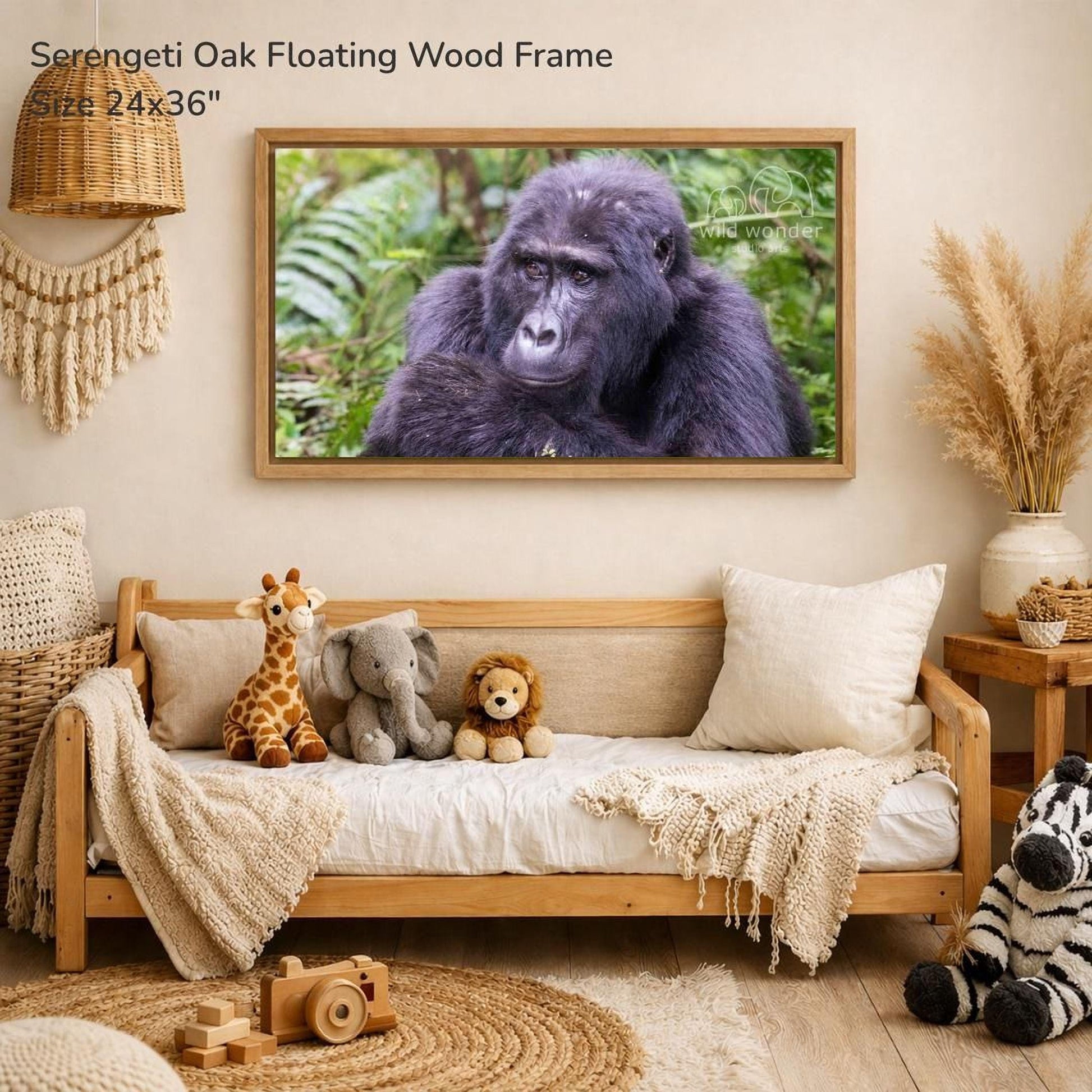 a serene indoor setting with a wooden frame hanging on a wall, displaying a photograph of a gorilla. The frame is surrounded by various stuffed animals, including a giraffe, an elephant, and a lion, creating a cozy and playful atmosphere.