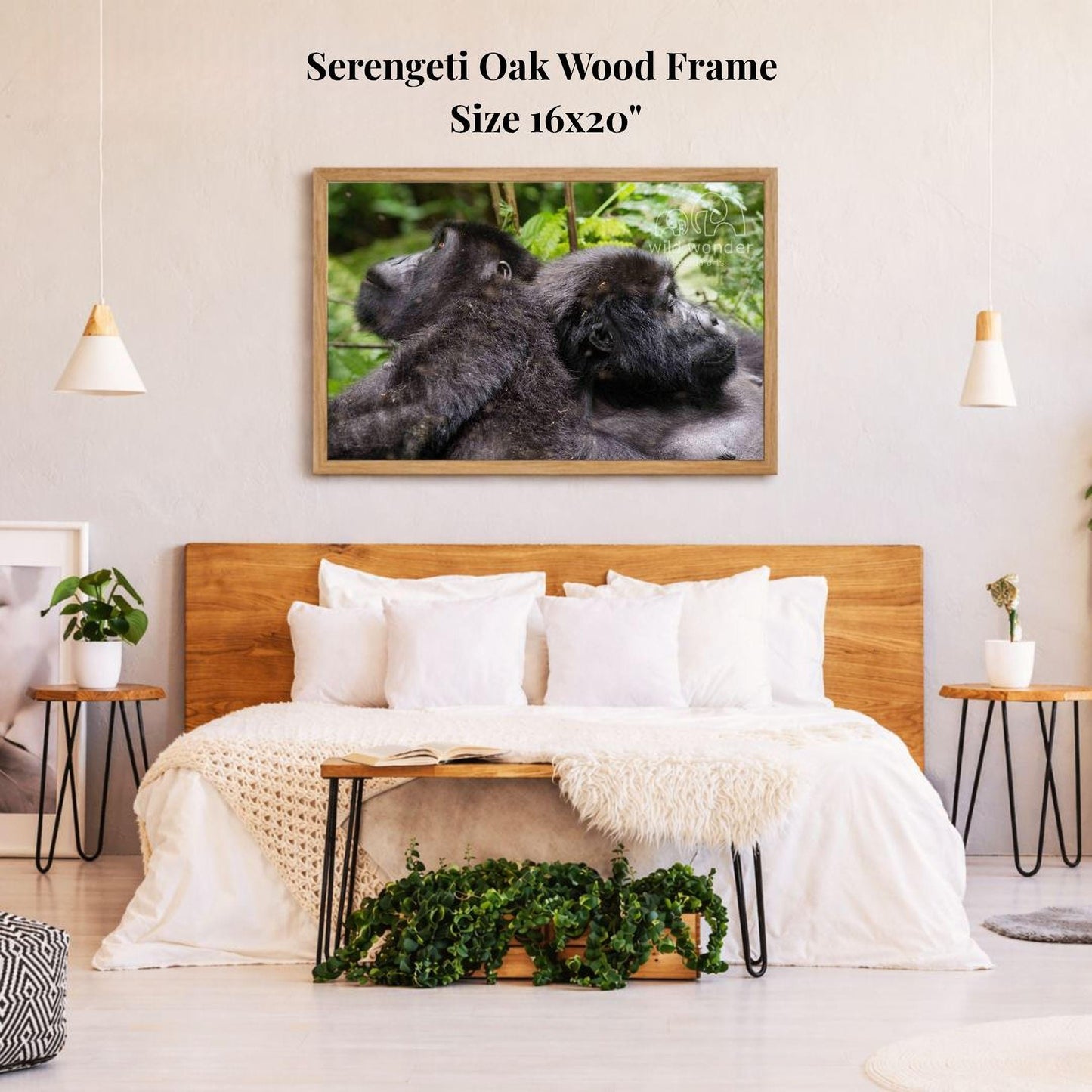 a serene bedroom setting with a large wooden headboard, a cozy bed with white bedding, and a framed photograph of two gorillas resting in the background.