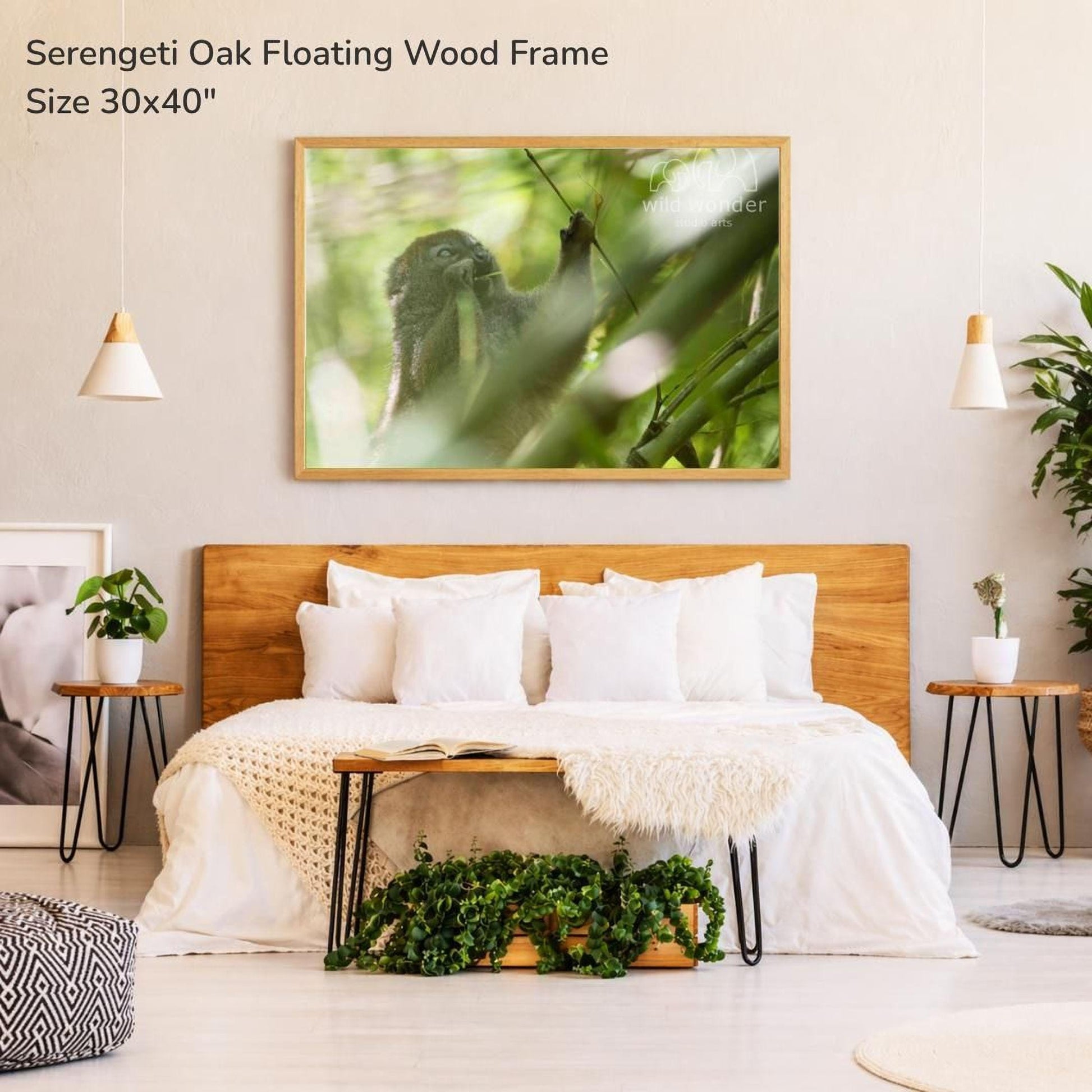 a serene bedroom setting with a large wooden headboard, a white bedspread, and a framed photograph of a bird perched on a branch. The photograph is framed in a wooden frame and hangs above the bed. The room is decorated with potted plants and other natural elements, creating a calming and peaceful atmosphere.