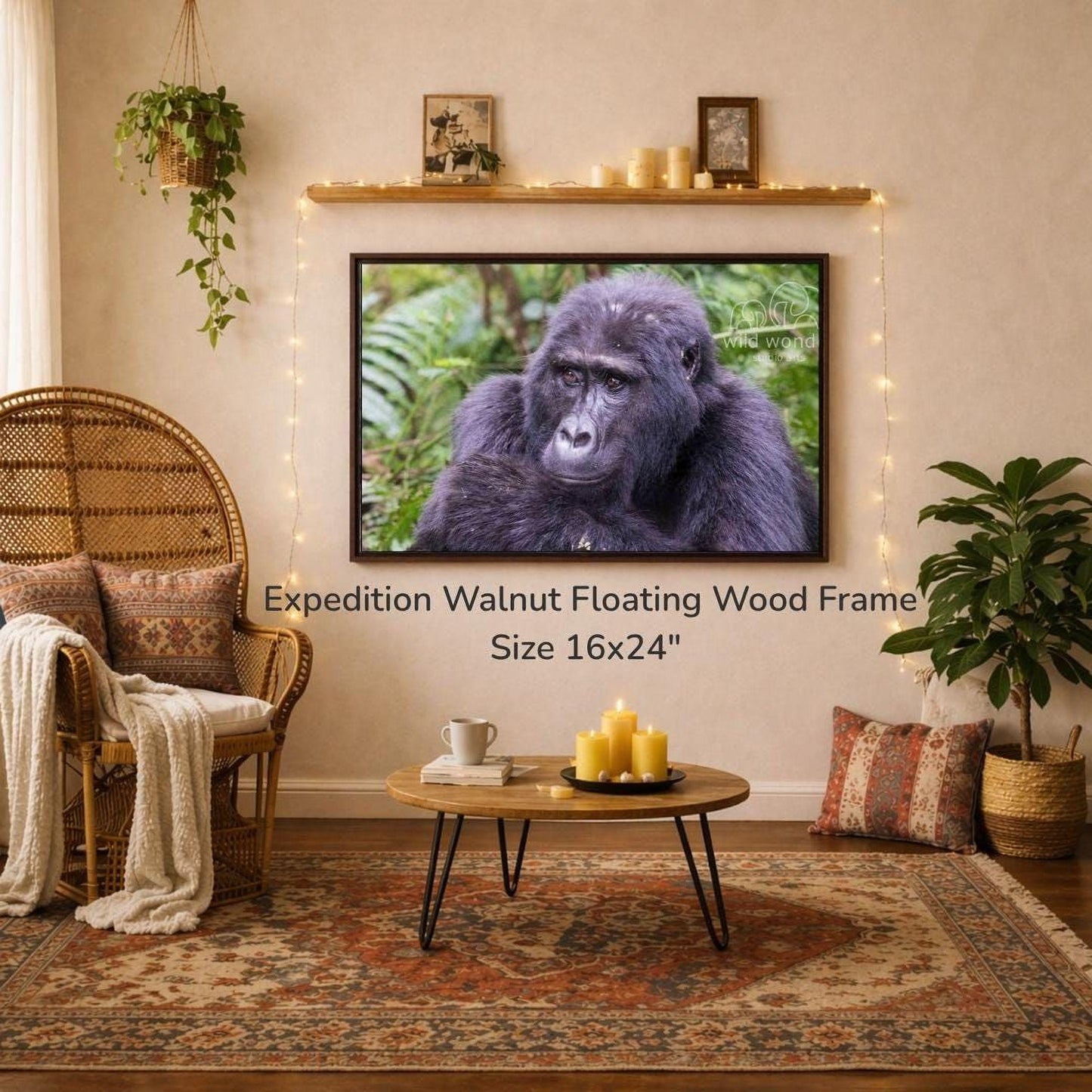 a large, 16x24" walnut floating wood frame hanging on a wall, with a framed photograph of a gorilla displayed above it. The room has a cozy, rustic atmosphere with a wicker chair, a coffee table, and various decorative elements such as plants and candles.