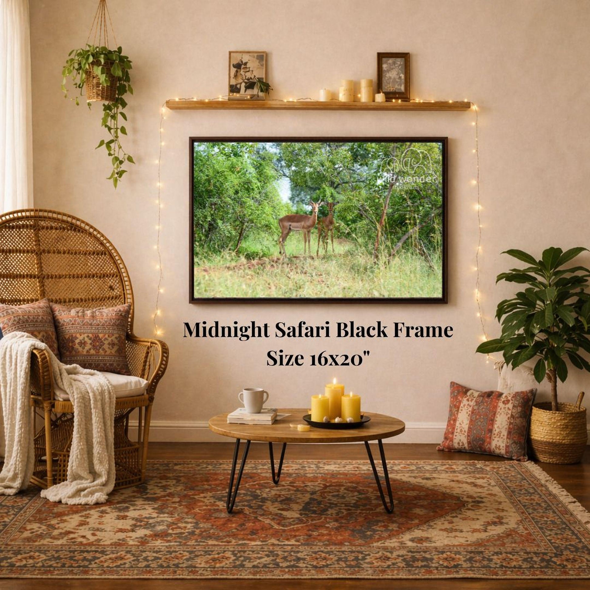 a living room with a large framed photograph of a deer on the wall, a wicker chair, a coffee table, and a potted plant.