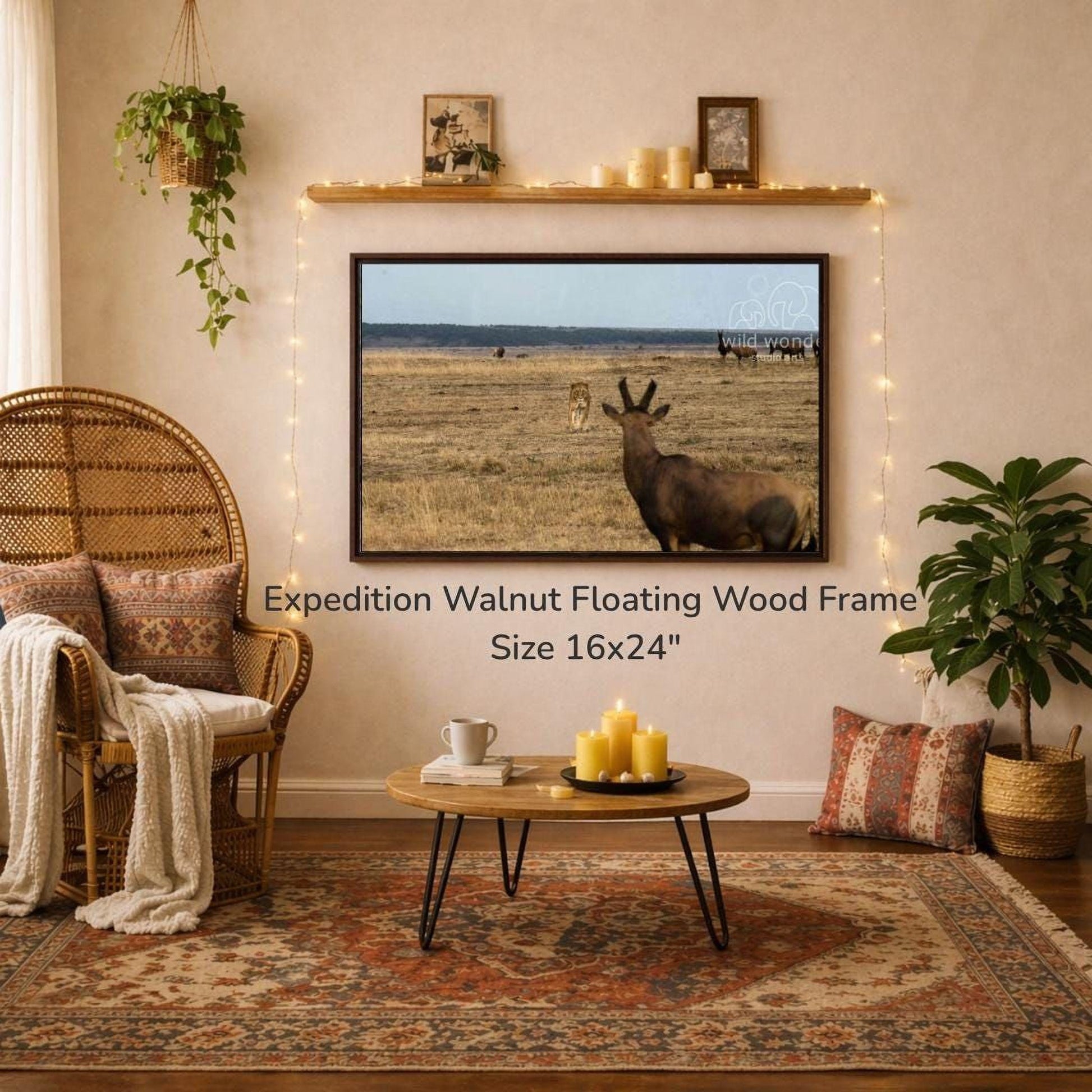 a living room with a large 16x24" floating wood frame hanging on the wall, depicting a wild animal in a grassy field. The room is decorated with a wicker chair, a coffee table, and a potted plant, creating a cozy and inviting atmosphere.