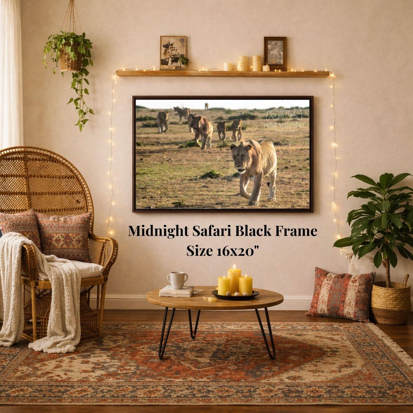 a living room with a large framed photograph of a group of lions on the wall, a wicker chair, a coffee table, and a potted plant.