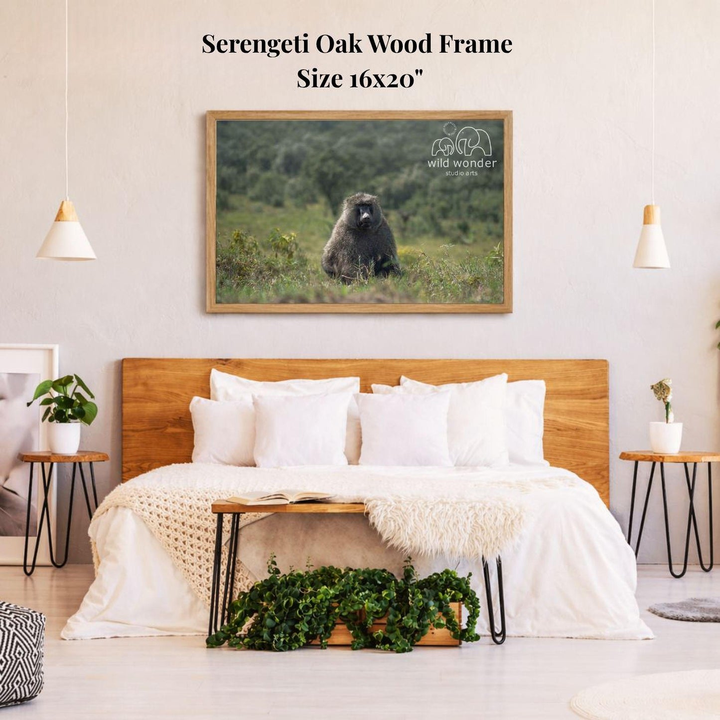 a serene bedroom scene with a large framed picture of a gorilla on the wall above a bed with white bedding.