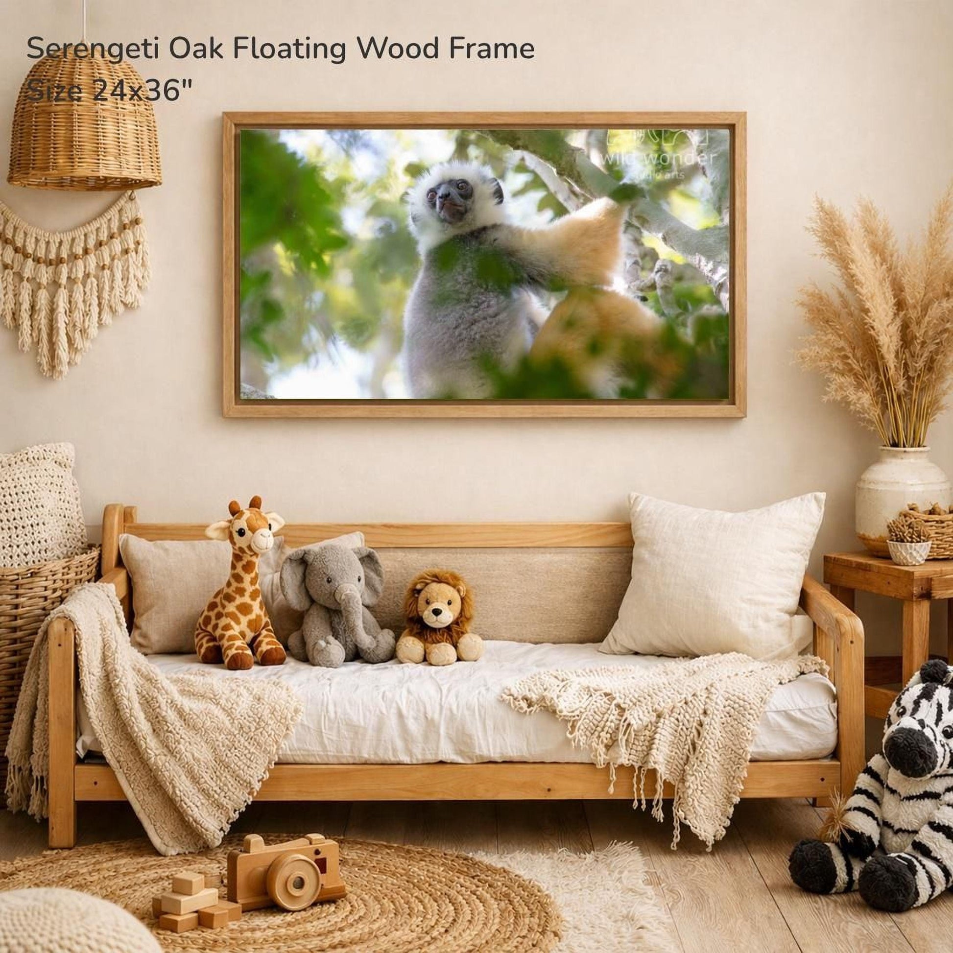 a serene indoor setting with a wooden frame hanging on a wall, displaying a photograph of a lemur in a tree. The frame is surrounded by various stuffed animals, including a giraffe, an elephant, and a lion, creating a cozy and playful atmosphere.