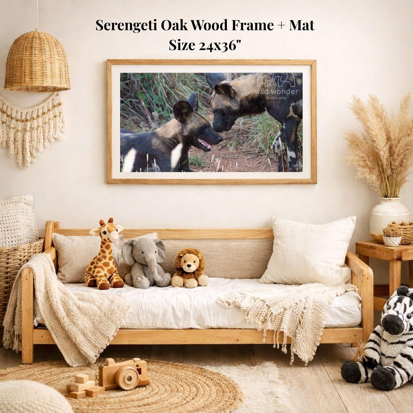 a serene indoor setting with a wooden frame and mat hanging on a wall, displaying a photograph of two wild dogs in a natural environment. The room is decorated with various items, including a wooden bench, a woven basket, a stuffed giraffe, a stuffed lion, and a stuffed zebra.