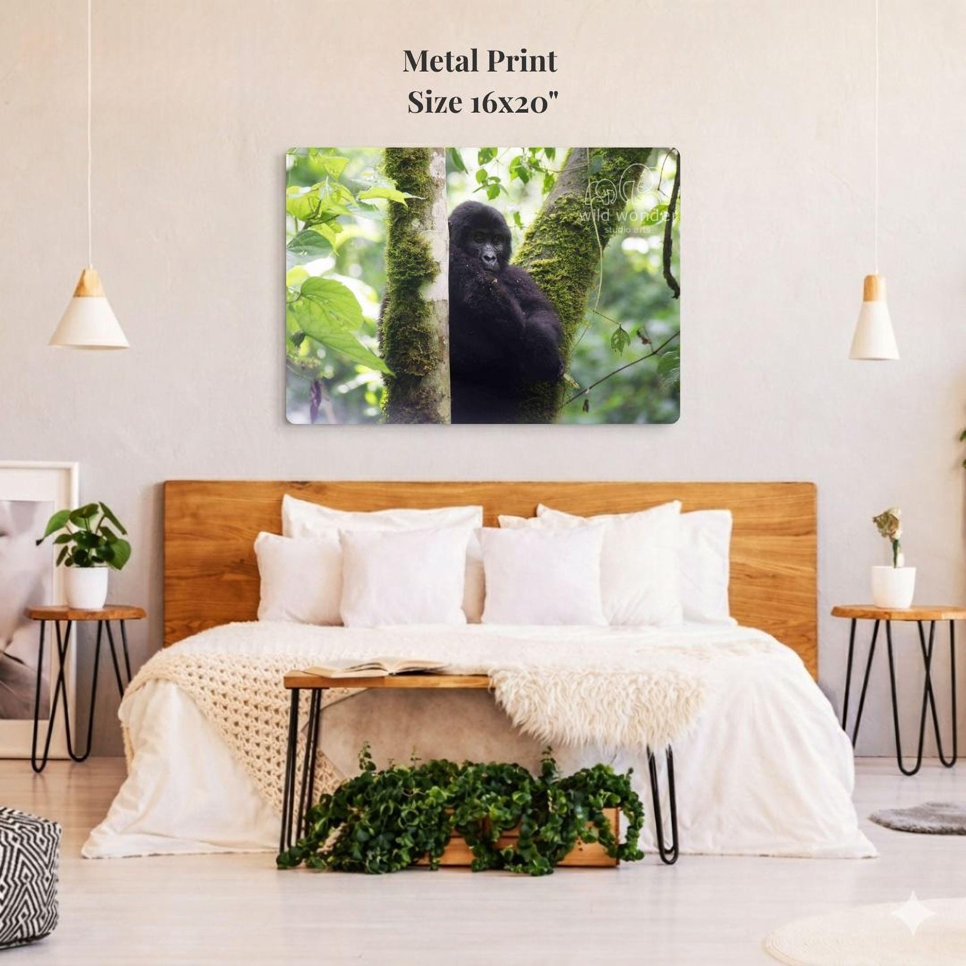 a bedroom with a large metal print of a gorilla perched on a tree branch hanging on the wall above a bed with white bedding.