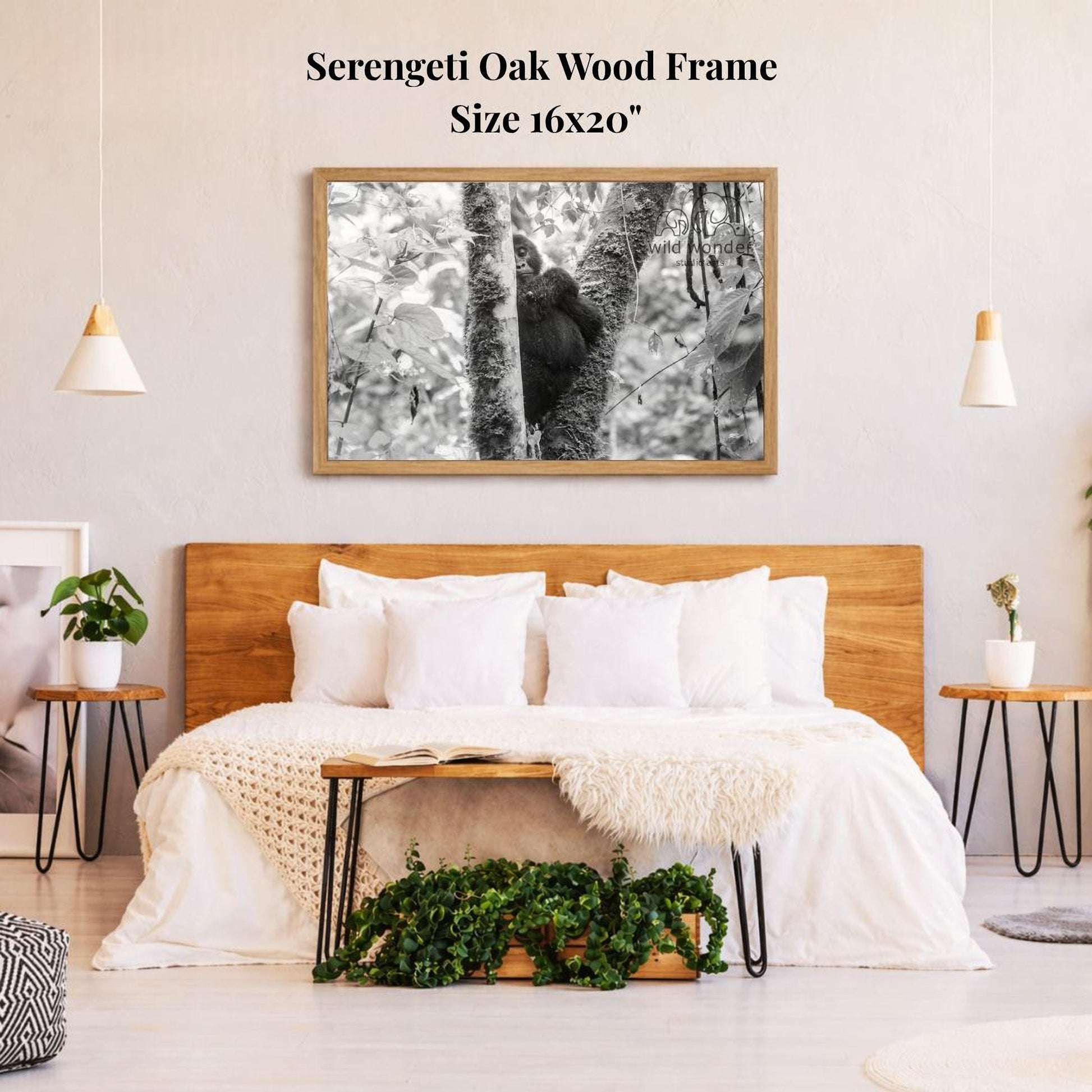 a serene bedroom setting with a large wooden headboard, a cozy bed with white bedding, and a framed photograph of a gorilla perched on a tree branch hanging above it.