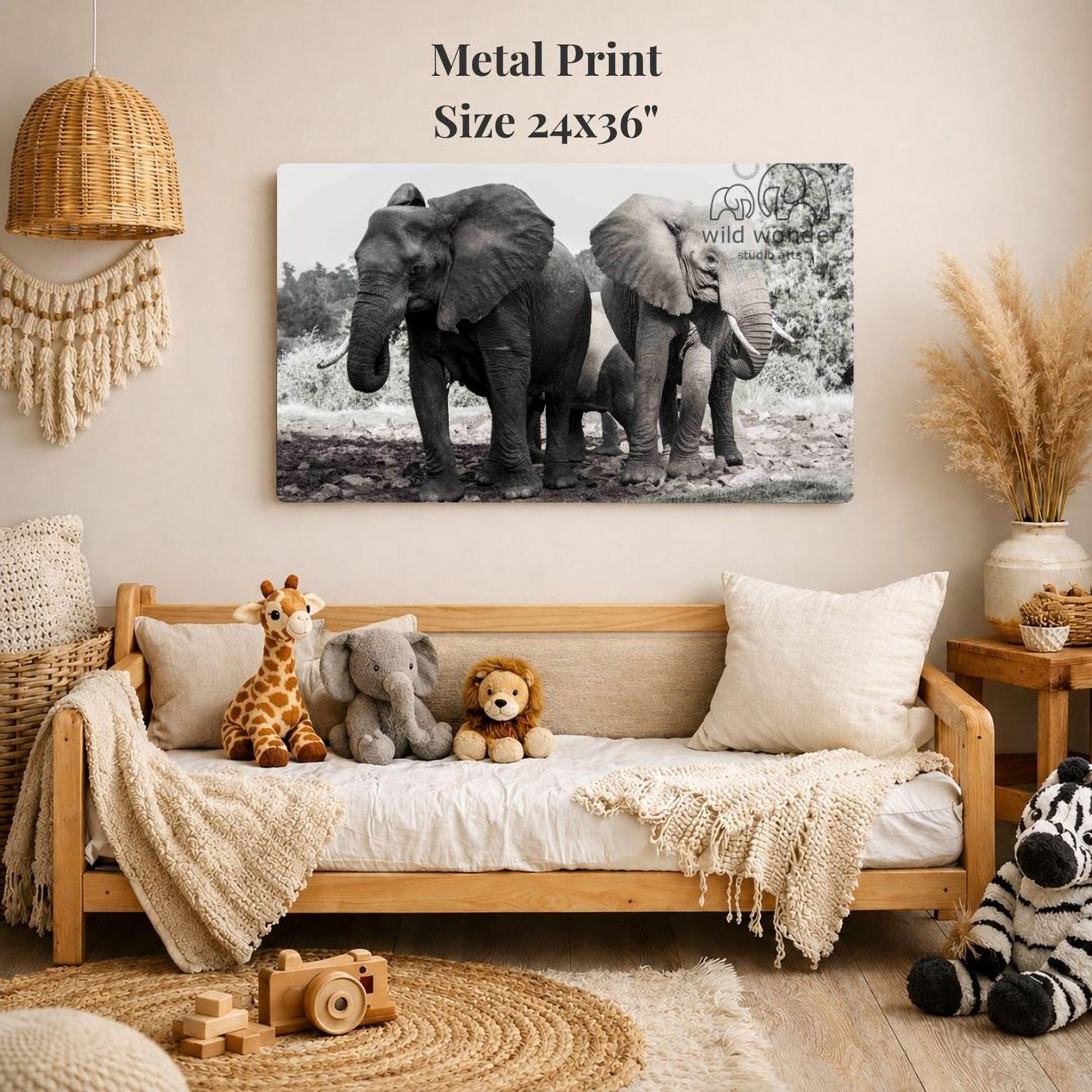 a cozy living room with a large metal print of three elephants on the wall, surrounded by various stuffed animals and a woven basket.