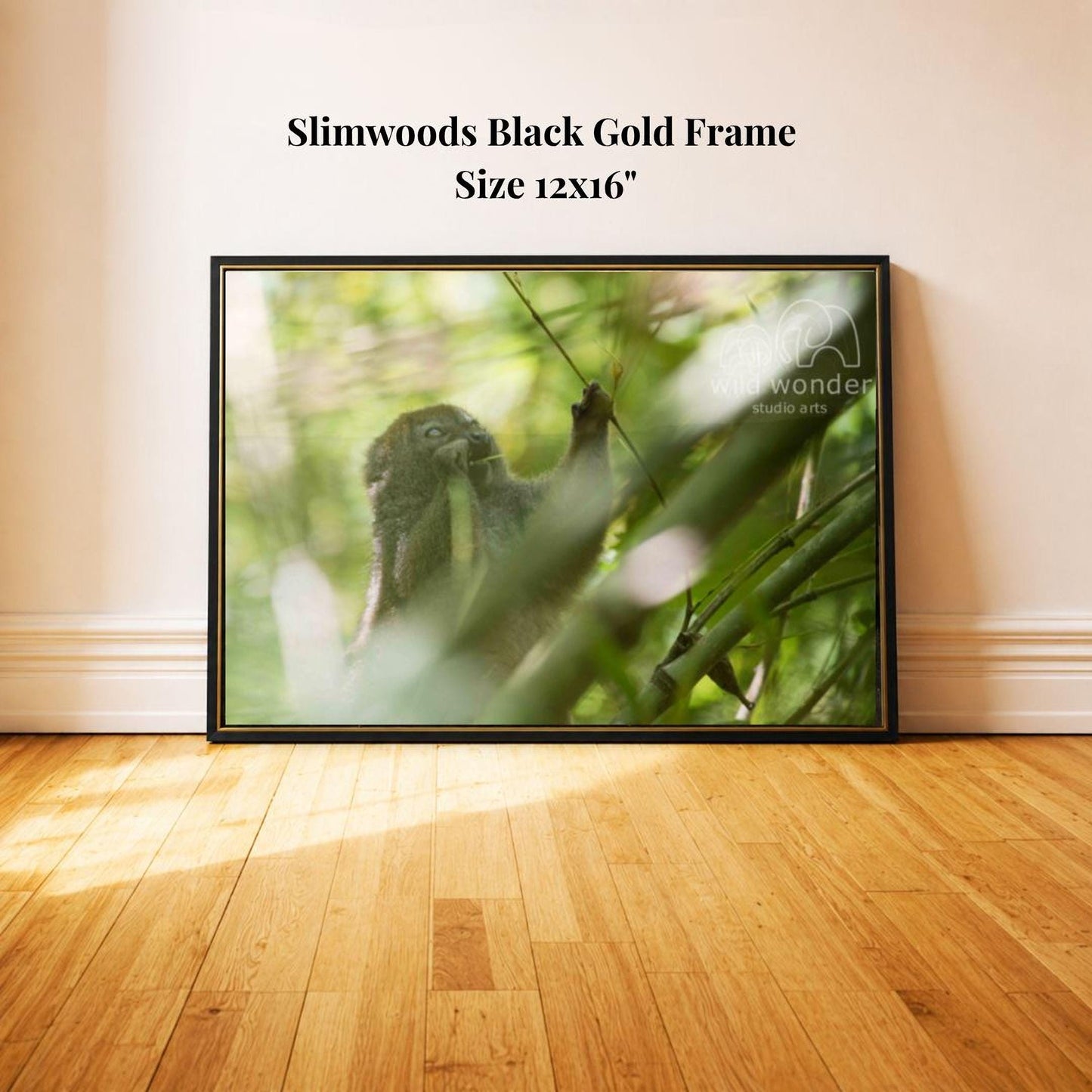 A framed photograph of a squirrel in a lush, green forest setting.