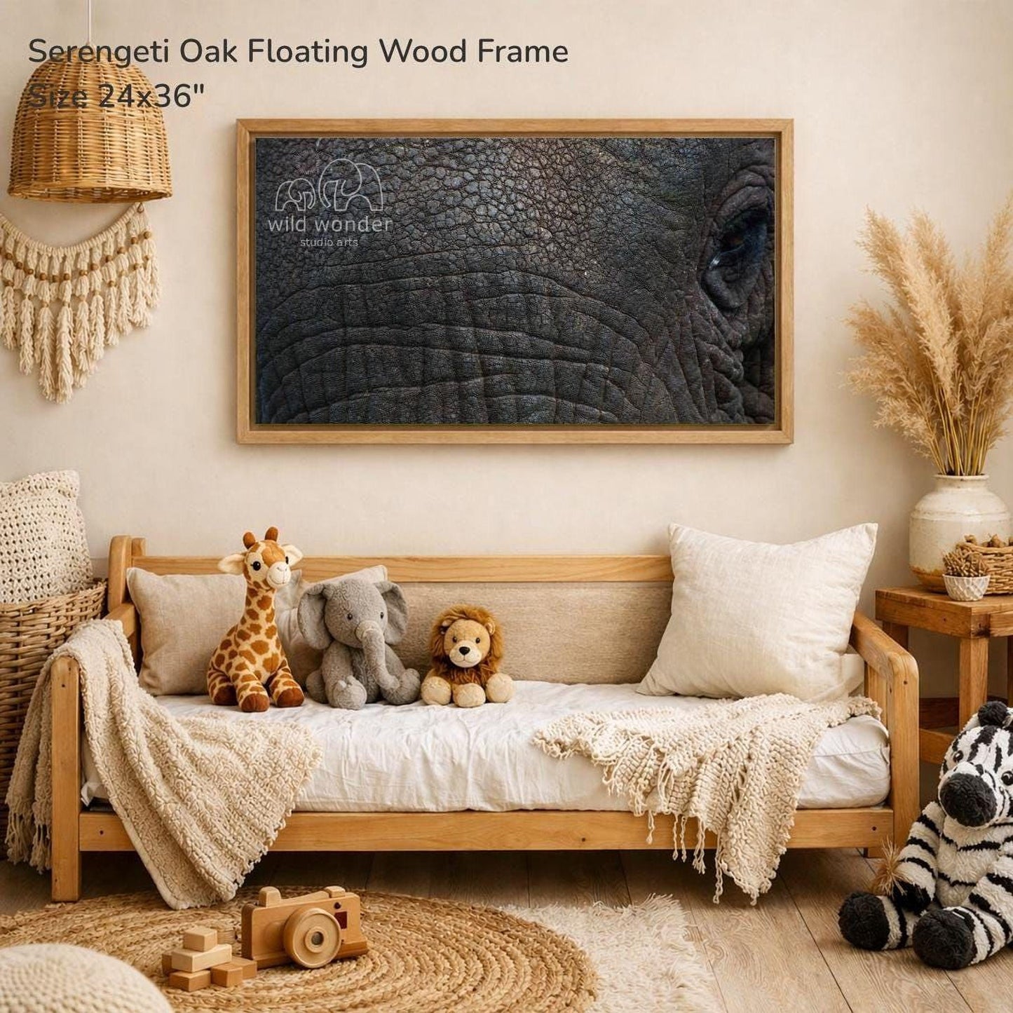 a serene and cozy living room with a large wooden frame hanging on the wall, displaying a close-up of an elephant's face. The room is adorned with various stuffed animals, including a giraffe, an elephant, and a lion, arranged on a couch and a bed. The room also includes a potted plant, a vase, and a wooden toy car, creating a warm and inviting atmosphere.
