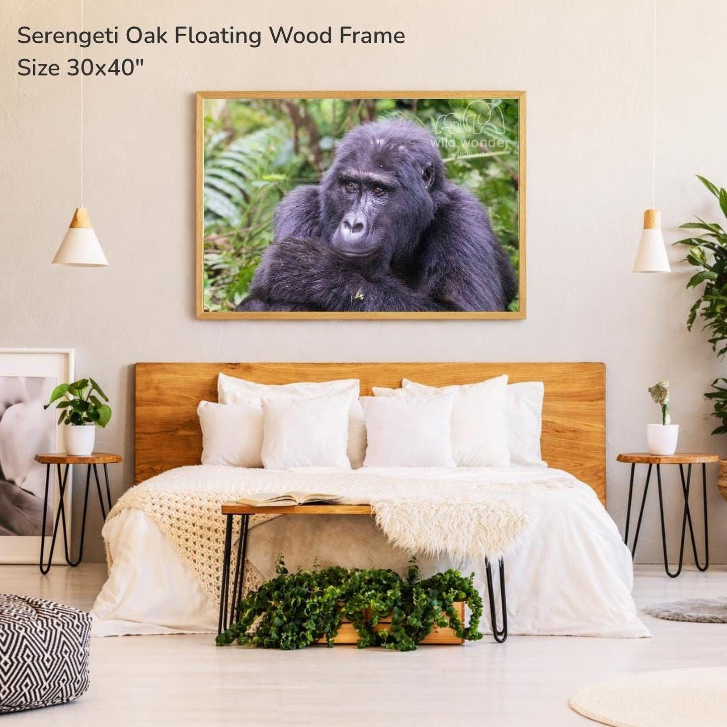 a bedroom with a large wooden headboard and a framed photograph of a gorilla hanging on the wall above it.