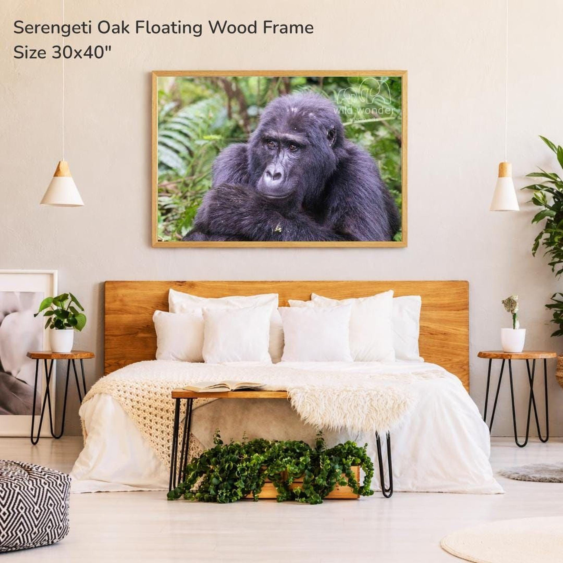a bedroom with a large wooden headboard and a framed photograph of a gorilla hanging on the wall above it.