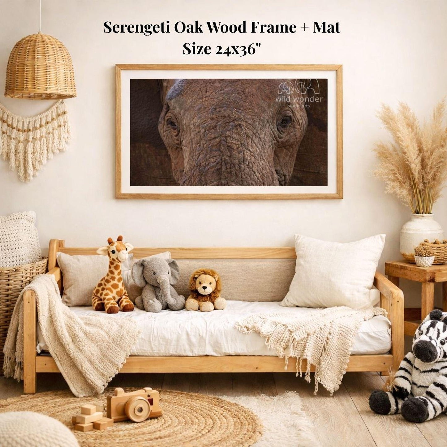 a serene and cozy living room with a wooden sofa adorned with plush toys, including a giraffe, elephant, lion, and zebra. Above the sofa hangs a framed photograph of an elephant, creating a warm and inviting atmosphere. The room is decorated with a woven basket, a potted plant, and a wooden toy car, adding to the overall charm and comfort of the space.