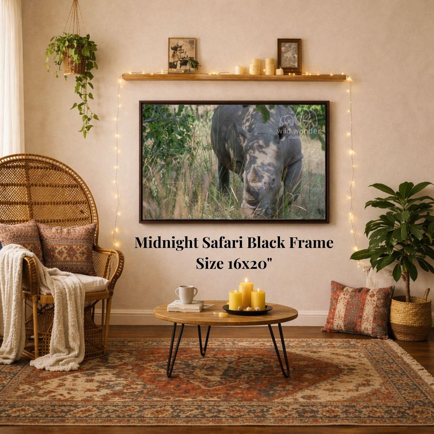 a living room with a large framed photograph of a rhinoceros hanging on the wall. The photograph is in a black frame and is 16x20 inches in size. The room is decorated with a wicker chair, a coffee table, and a potted plant. The overall atmosphere of the room appears to be cozy and inviting.