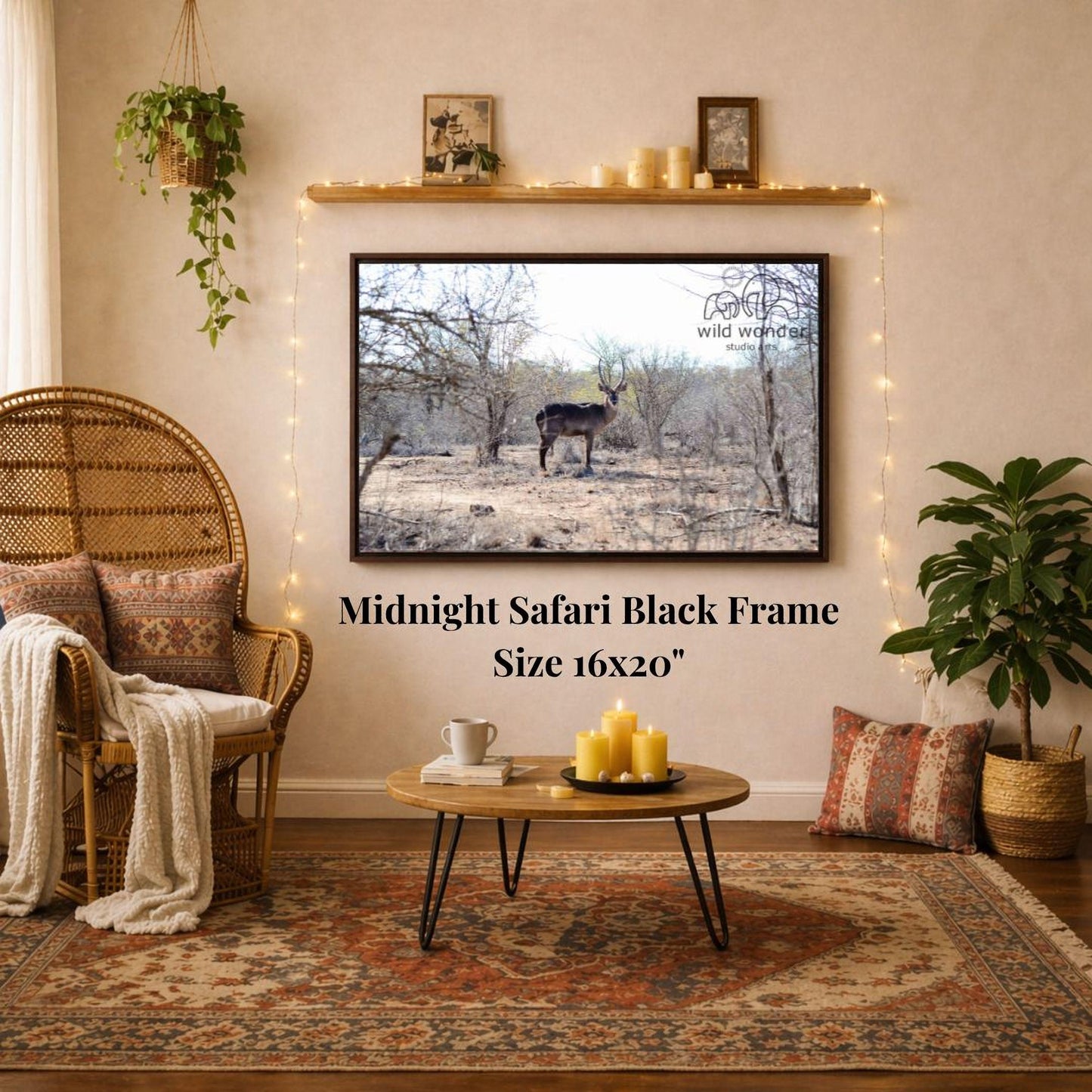 a living room with a large framed photograph of a deer on the wall, a wicker chair, a coffee table, and a potted plant.