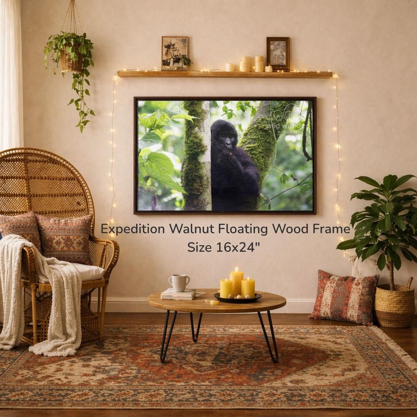 a cozy living room with a large 16x24" walnut floating wood frame hanging on the wall, a coffee table in front of it, and a wicker chair. The room is decorated with potted plants, candles, and a rug, creating a warm and inviting atmosphere.