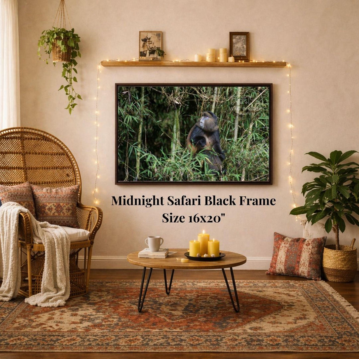 a living room with a large framed photograph of a black and white safari scene hanging on the wall. The photograph appears to be of a monkey in a jungle setting. The room is decorated with various plants, candles, and a wicker chair, creating a cozy and inviting atmosphere.