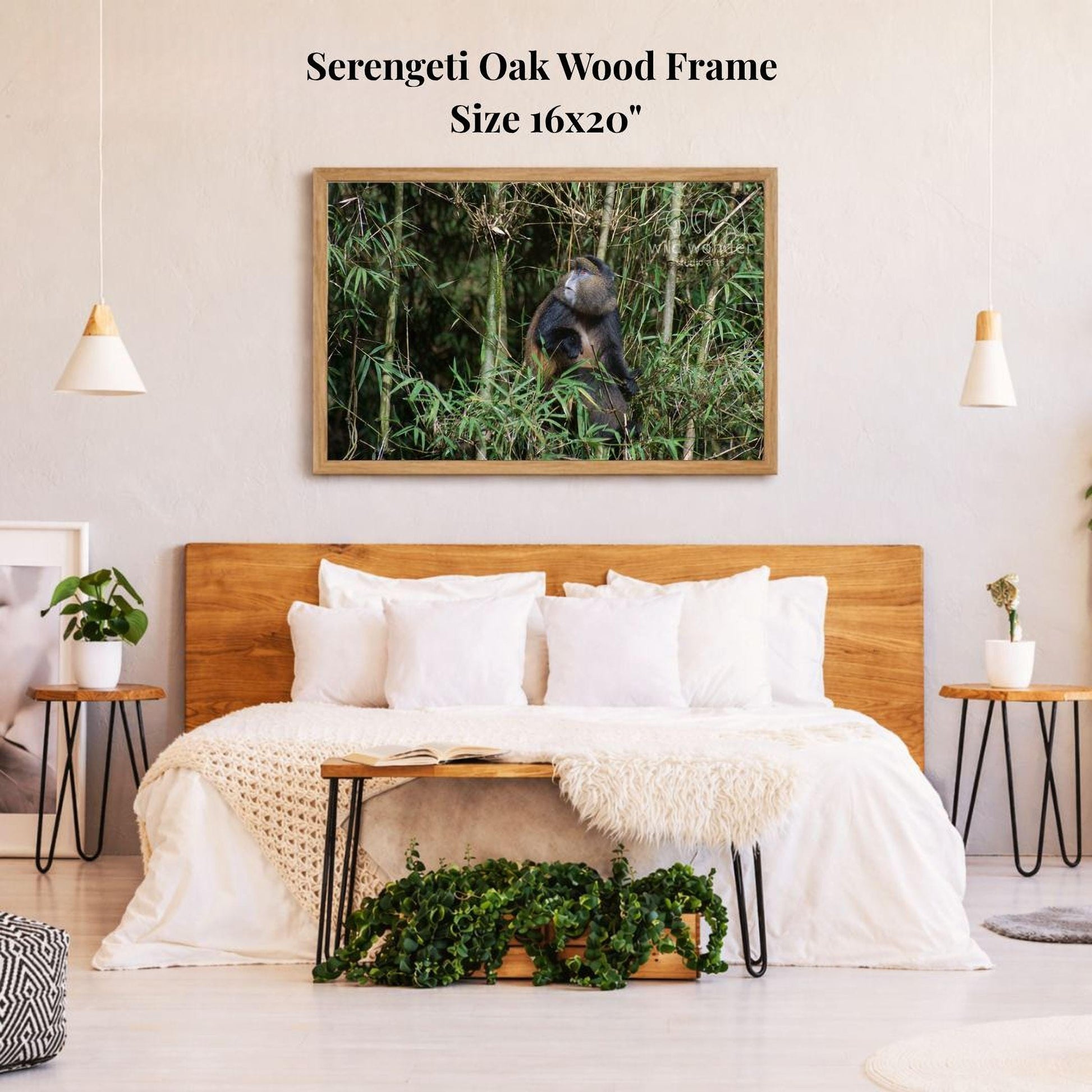 a serene bedroom setting with a large, 16x20" framed photograph of a serene oak wood frame hanging on the wall above a bed with white bedding.