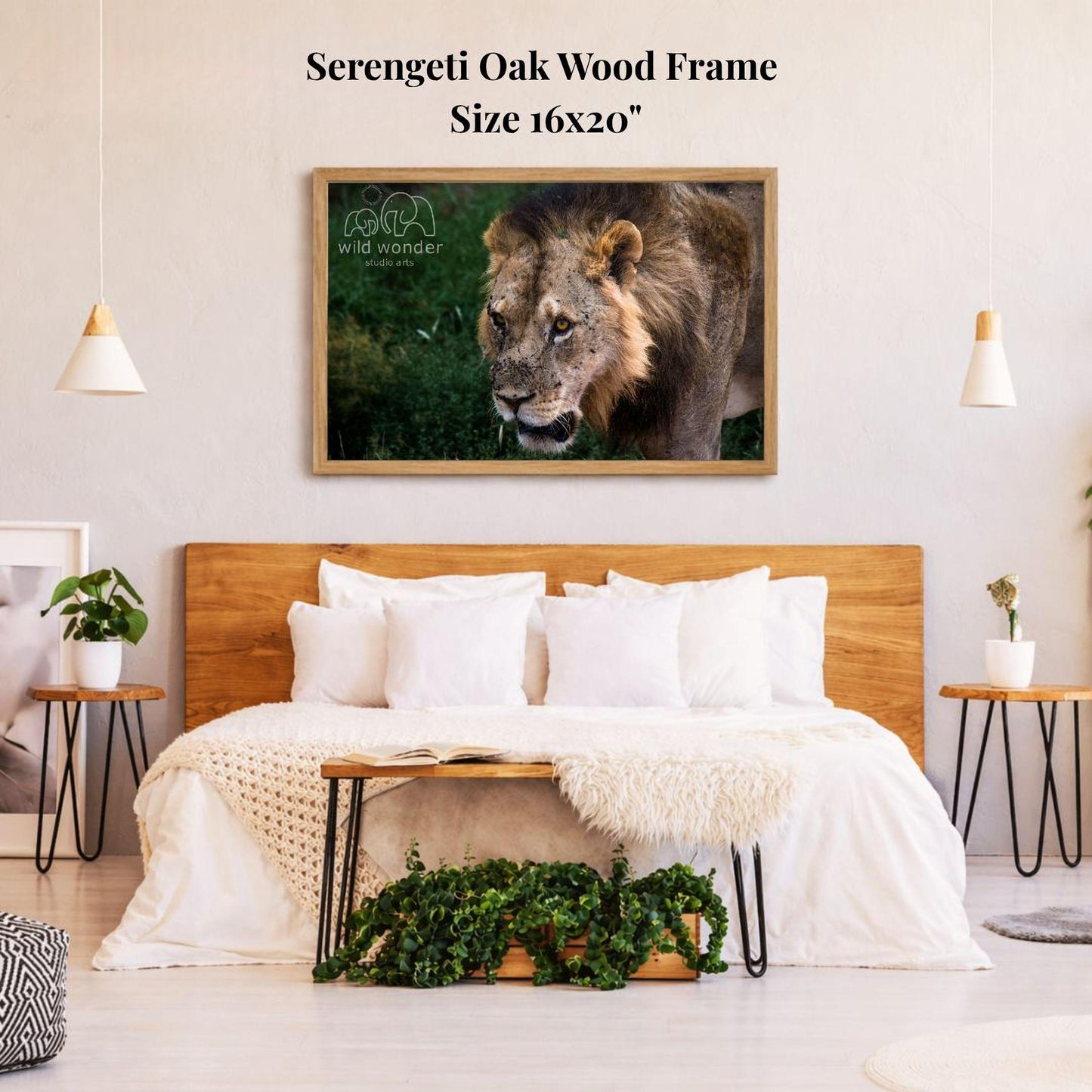 a serene bedroom setting with a large framed picture of a lion on the wall above a bed with white bedding.