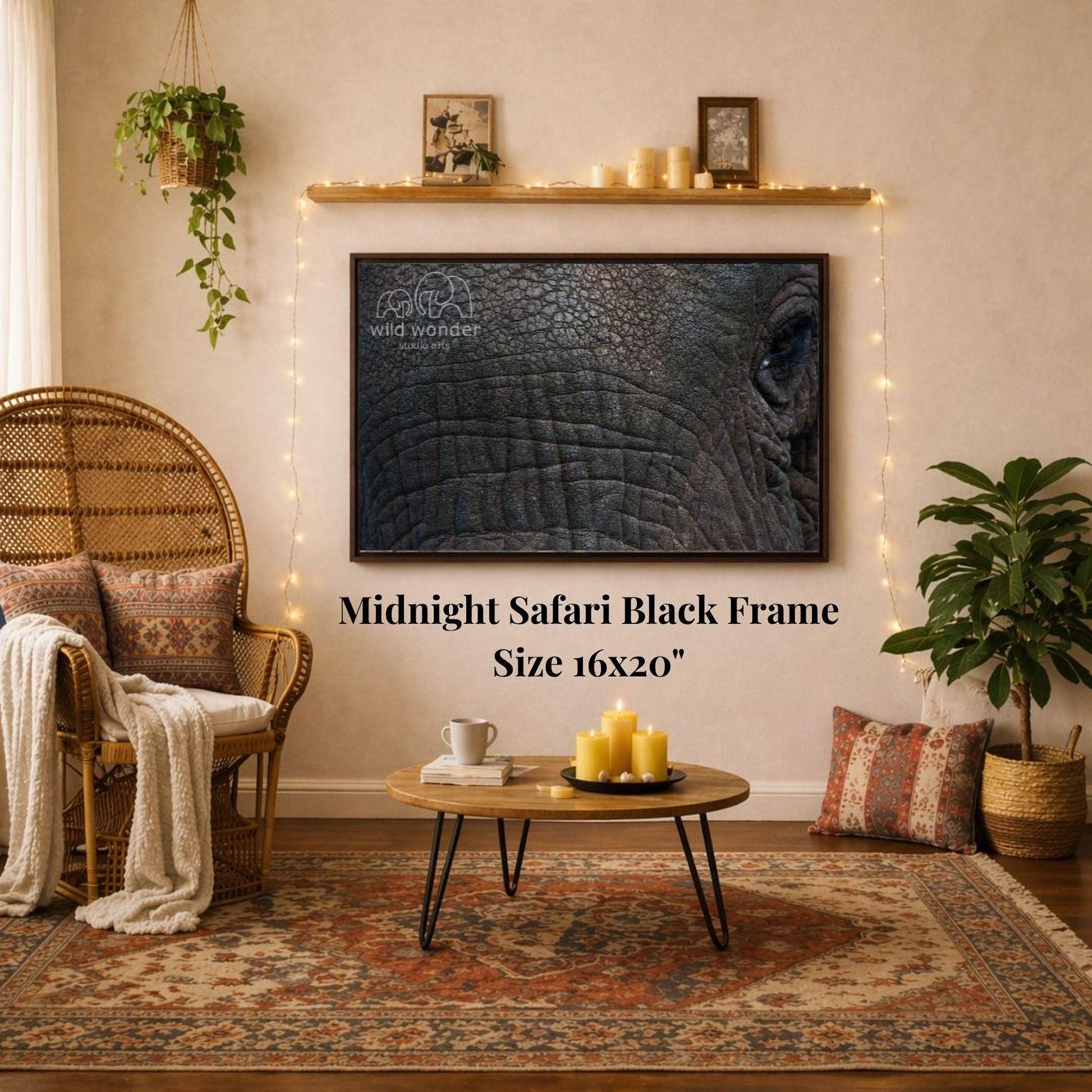 a living room with a large framed photograph of an elephant on the wall, a wicker chair, a coffee table, and a potted plant.
