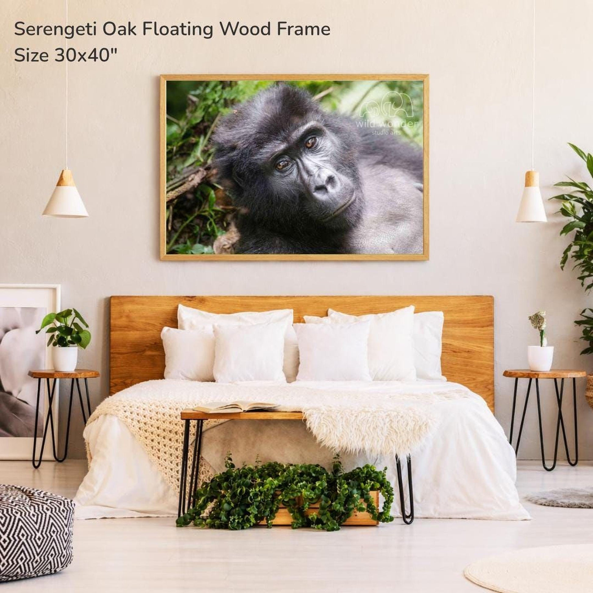 a bedroom with a large wooden headboard and a framed photograph of a gorilla on the wall above it. The room has a cozy and inviting atmosphere, with a comfortable bed, potted plants, and other decorative elements.