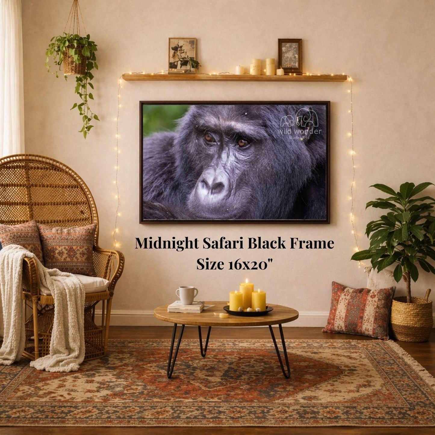 a living room with a large framed photograph of a gorilla hanging on the wall. The room has a cozy and inviting atmosphere, with a wicker chair, a coffee table, and a potted plant. The photograph is mounted on a wooden wall, and the text "Midnight Safari Black Frame" and "Size 16x20" is displayed below the image.