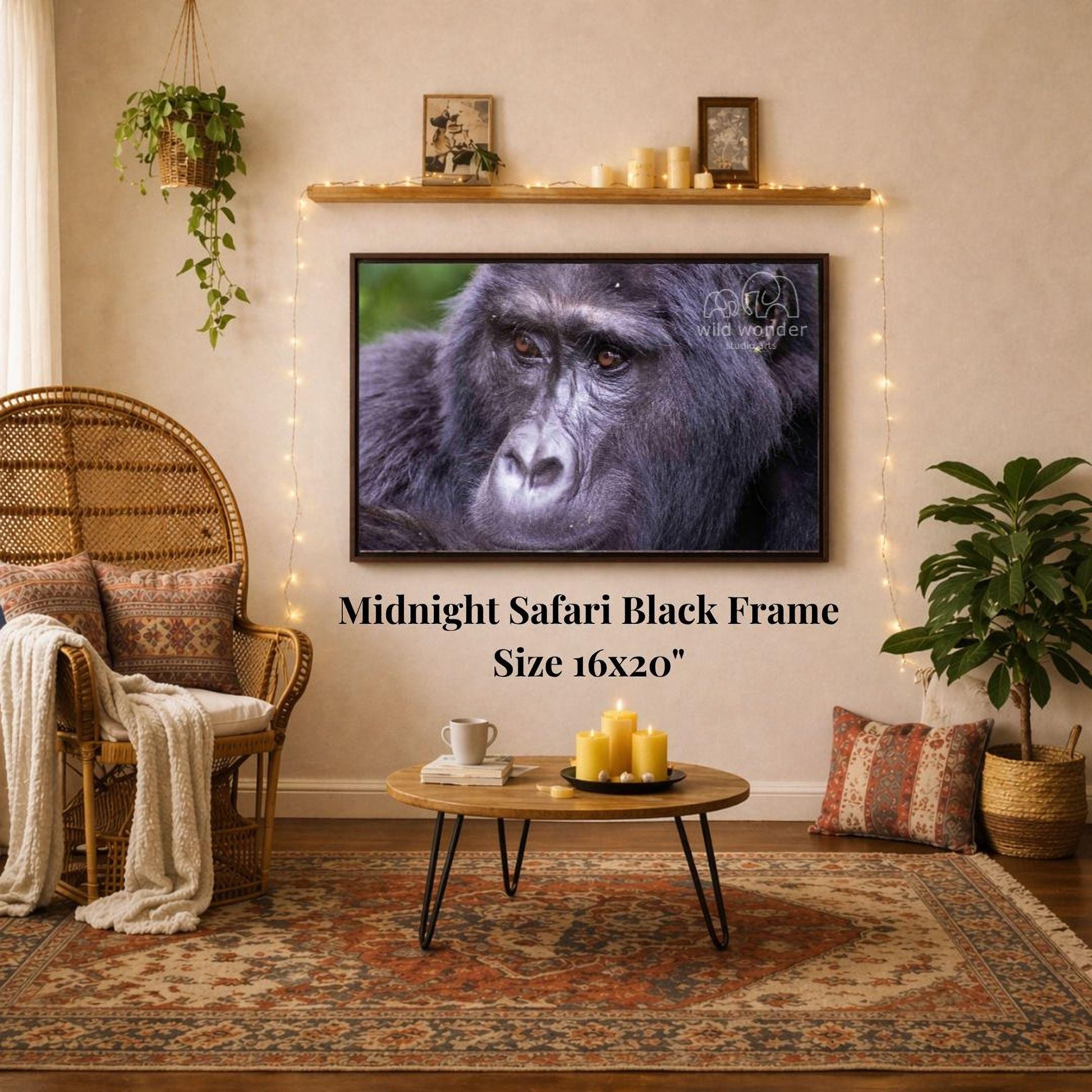 a living room with a large framed photograph of a gorilla hanging on the wall. The room has a cozy and inviting atmosphere, with a wicker chair, a coffee table, and a potted plant. The photograph is mounted on a wooden wall, and the text "Midnight Safari Black Frame" and "Size 16x20" is displayed below the image.