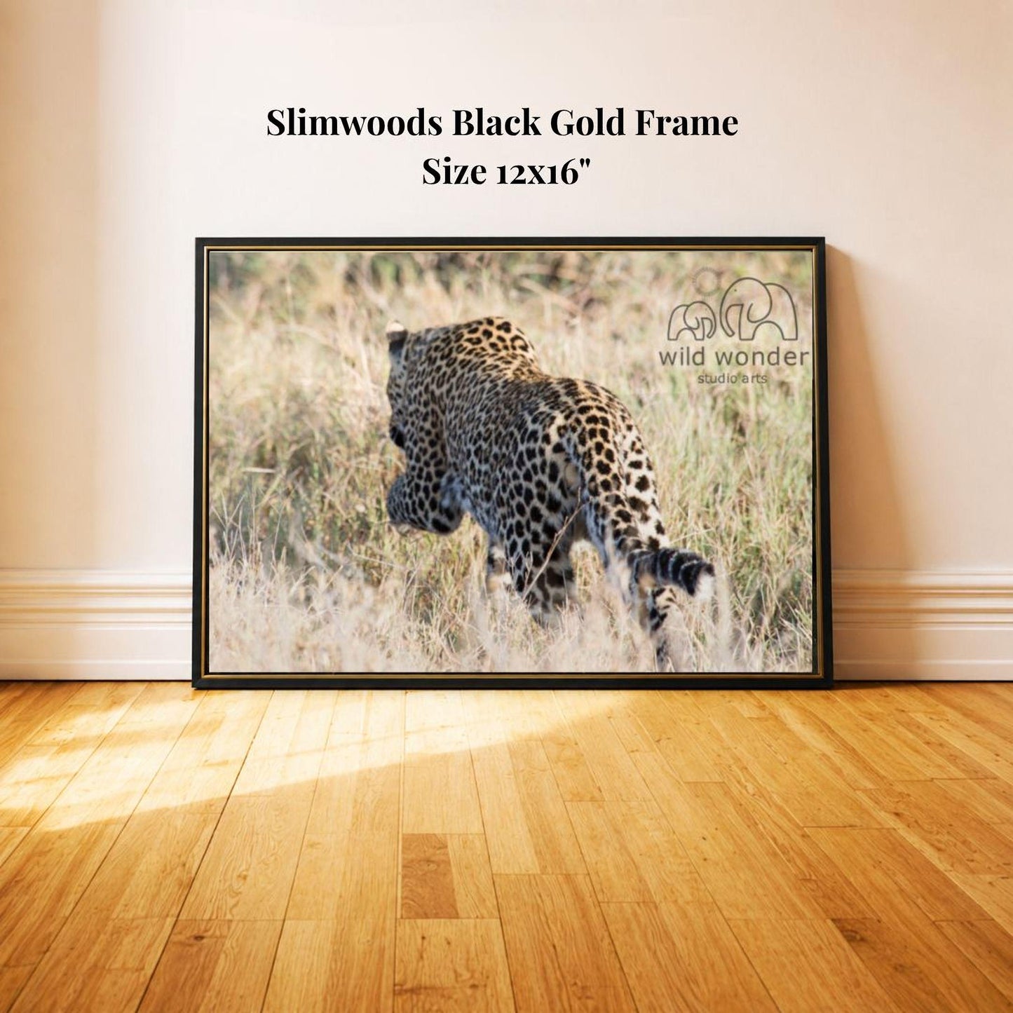 A framed photograph of a leopard in a grassy field, with the text "Slimwoods Black Gold Frame" and "Size 12x16" printed on the frame.