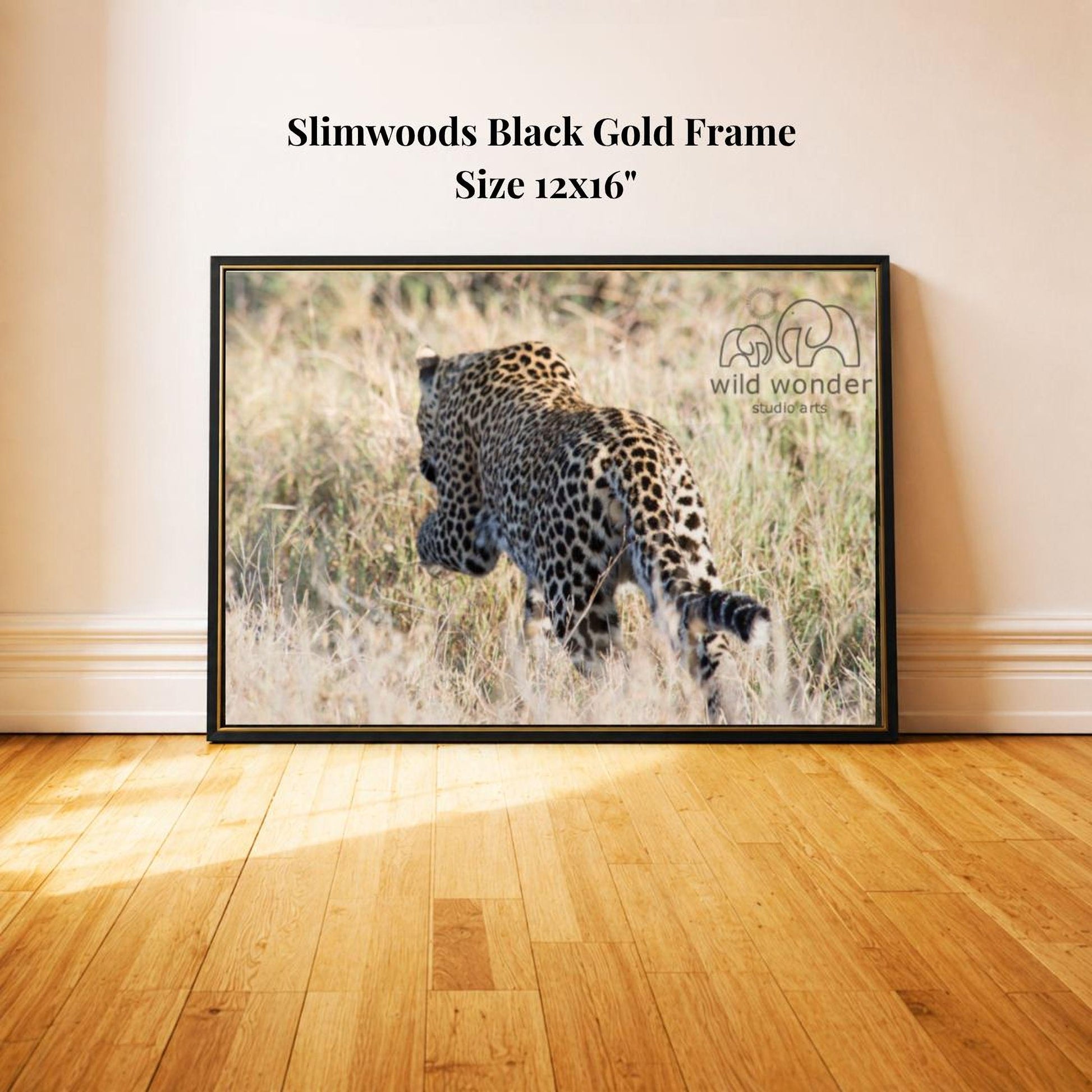 A framed photograph of a leopard in a grassy field, with the text "Slimwoods Black Gold Frame" and "Size 12x16" printed on the frame.