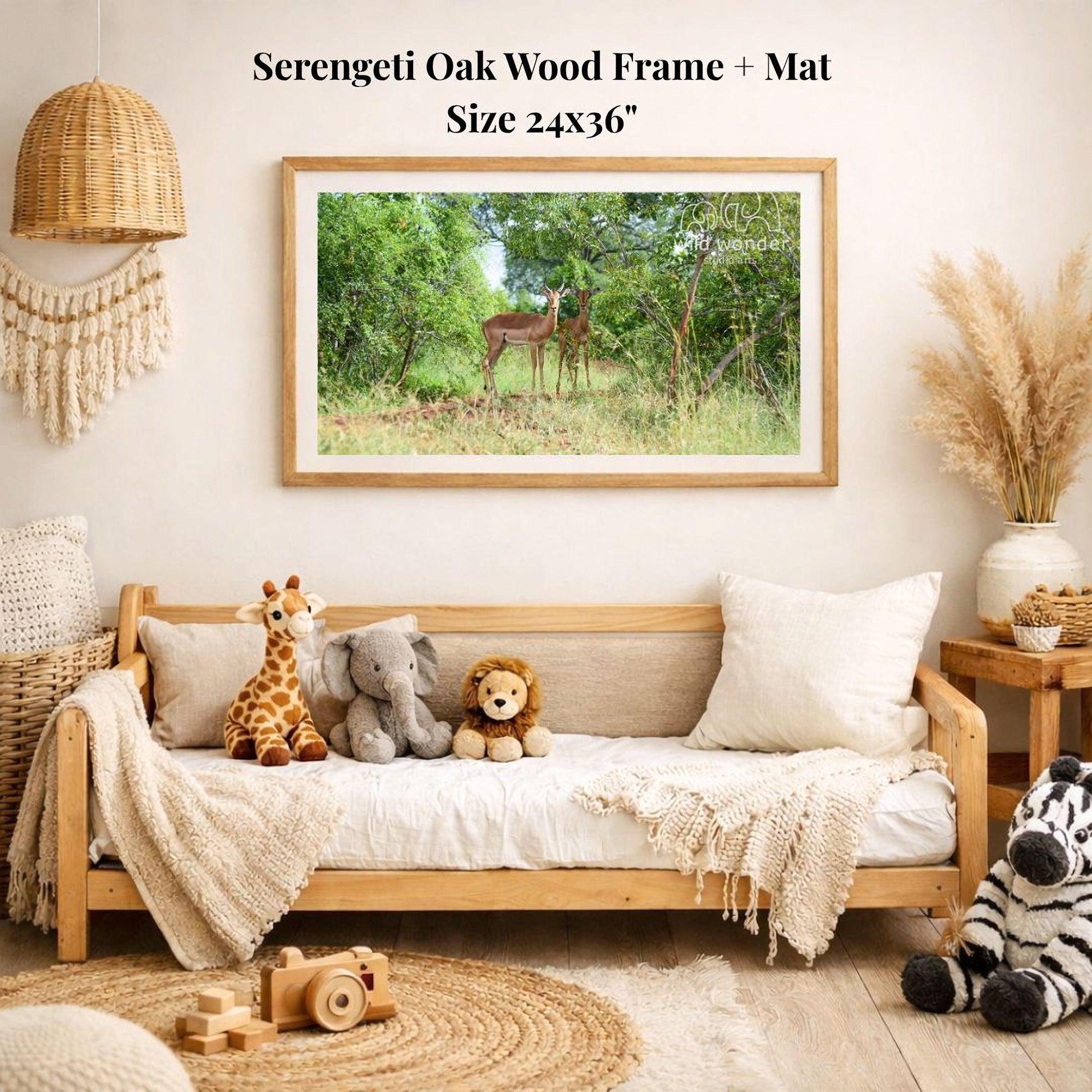 a serene indoor setting with a wooden frame and mat hanging on the wall, displaying a photograph of a deer in a forest. The room is decorated with various items, including a sofa with stuffed animals, a potted plant, and a woven basket.