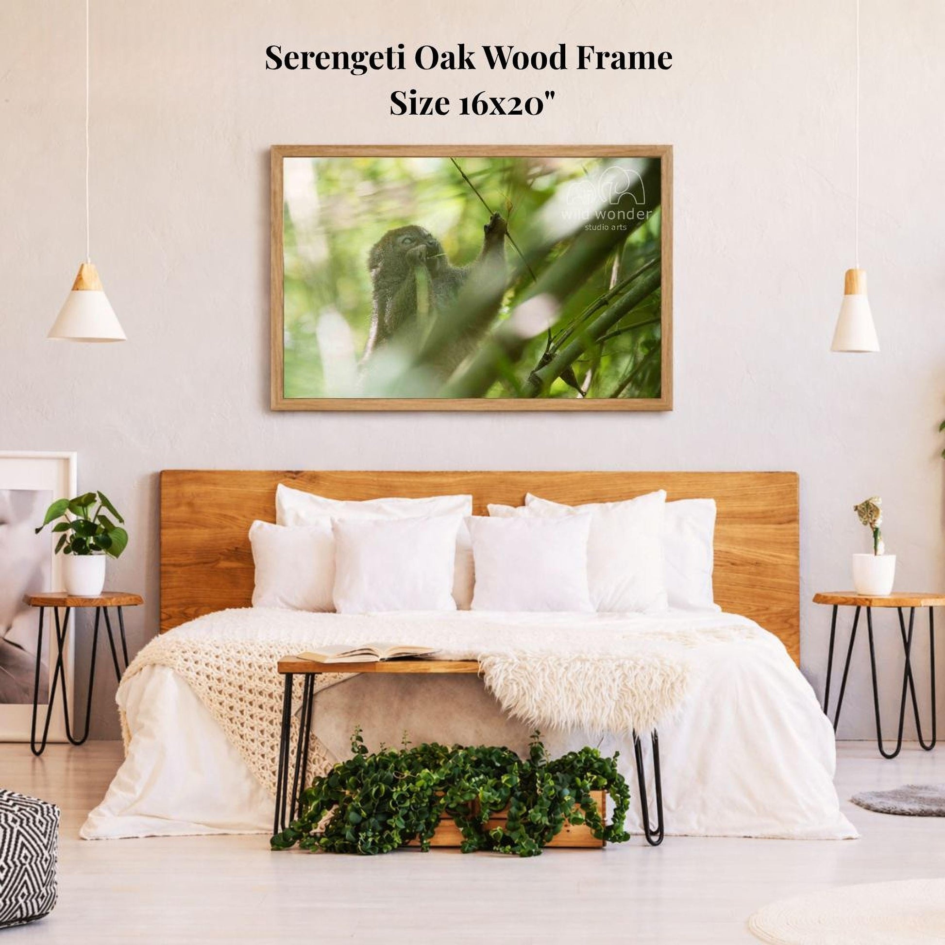 a serene bedroom setting with a large, 16x20" framed photograph of a bird perched on a branch hanging on the wall above a bed with white bedding and a wooden headboard.