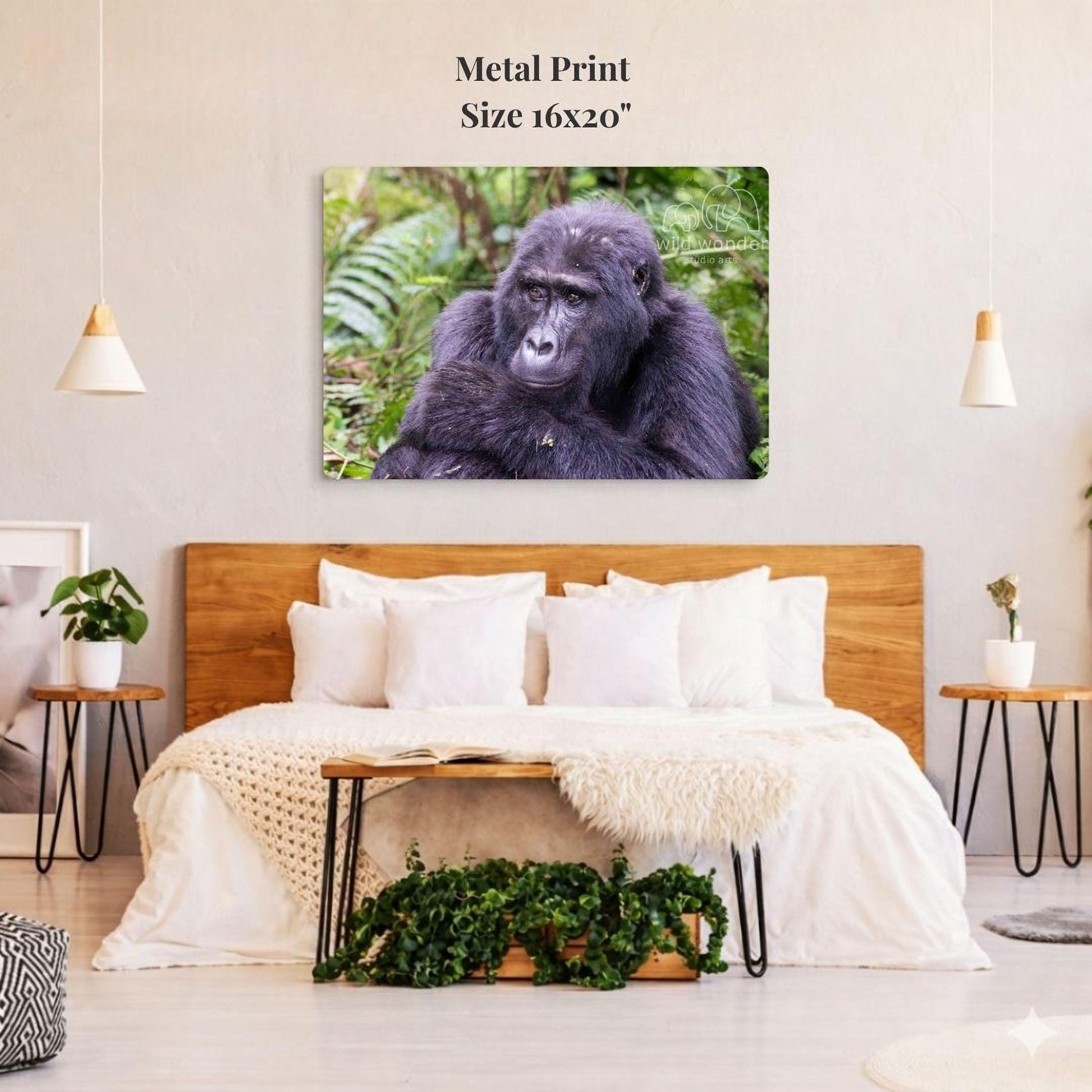 a bedroom with a large metal print of a gorilla on the wall above a bed with white bedding.