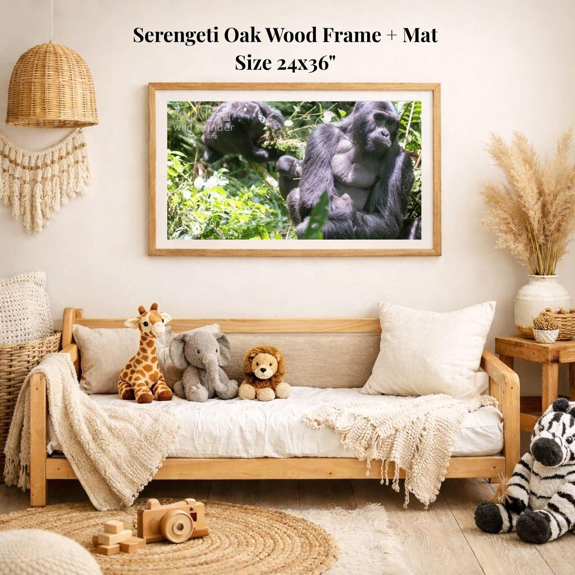 a serene indoor setting with a wooden frame and mat hanging on a wall, displaying a photograph of two gorillas in their natural habitat. The room is decorated with various stuffed animals, including a giraffe, elephant, lion, and zebra, creating a cozy and playful atmosphere.