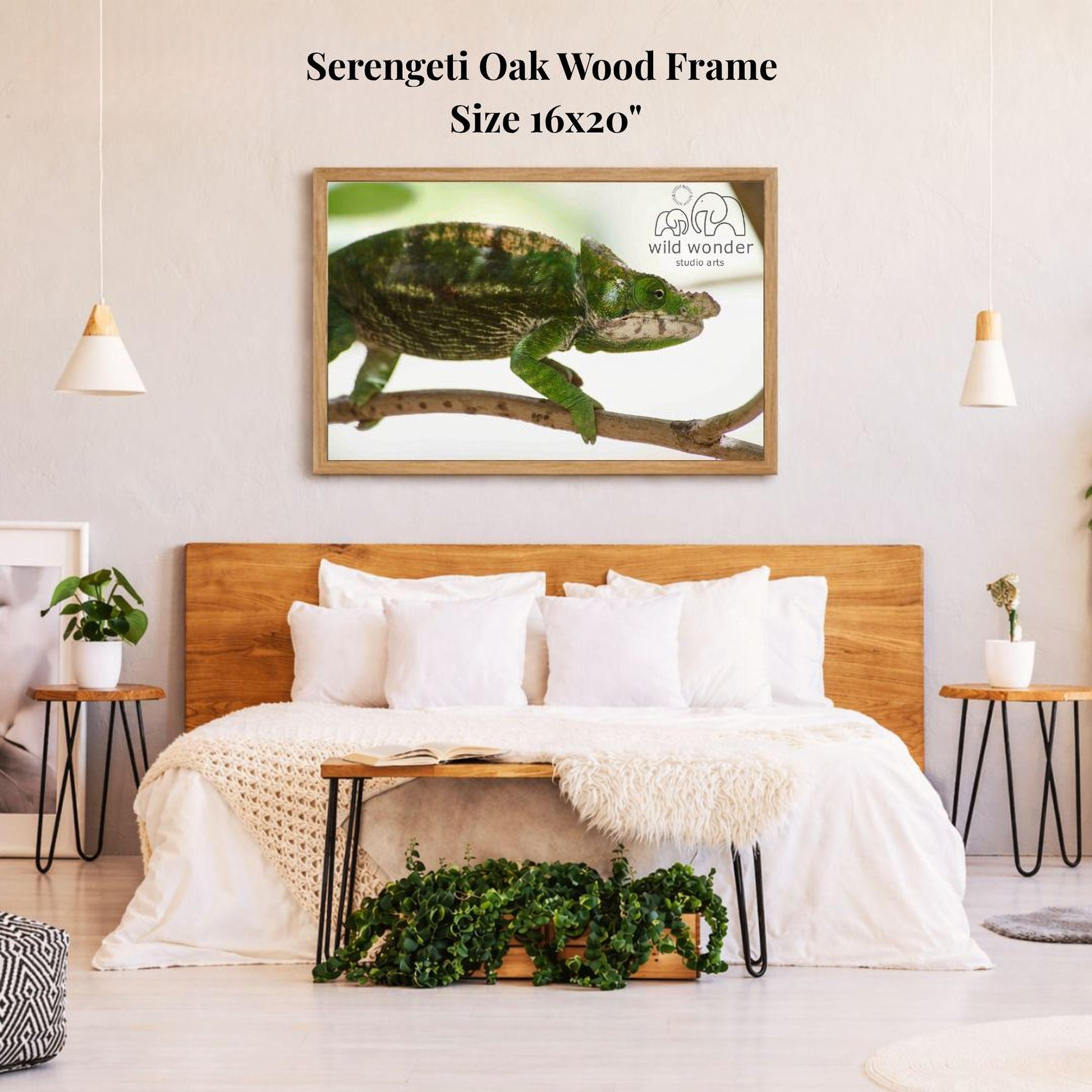 a bedroom with a large framed picture of a chameleon on the wall above a bed with white bedding.