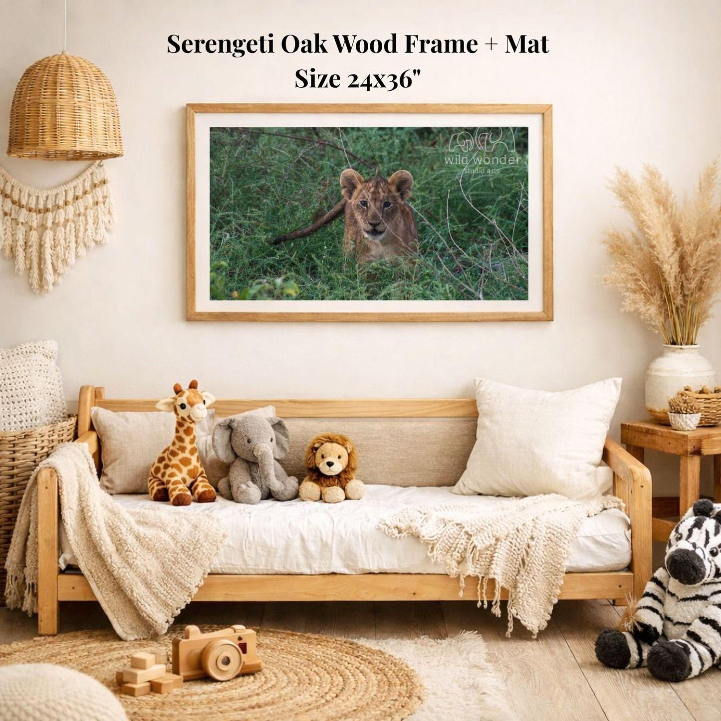 a serene indoor setting with a wooden frame and mat hanging on a wall, displaying a photograph of a lioness in the wild. The frame is surrounded by various stuffed animals, including a giraffe, an elephant, and a lion, creating a cozy and playful atmosphere.