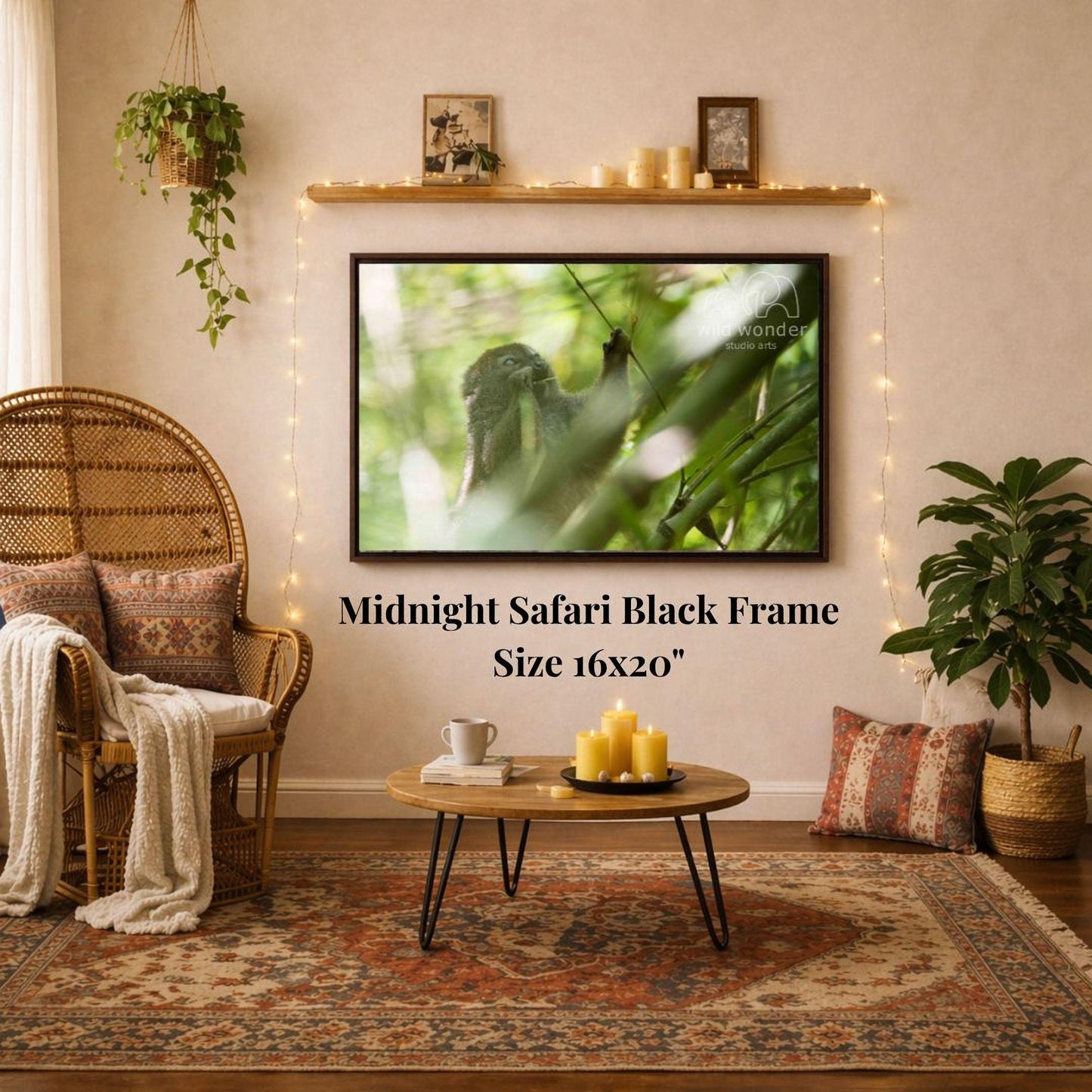 a cozy living room with a large framed picture of a safari scene hanging on the wall, a wicker chair, a coffee table with candles, and a potted plant.