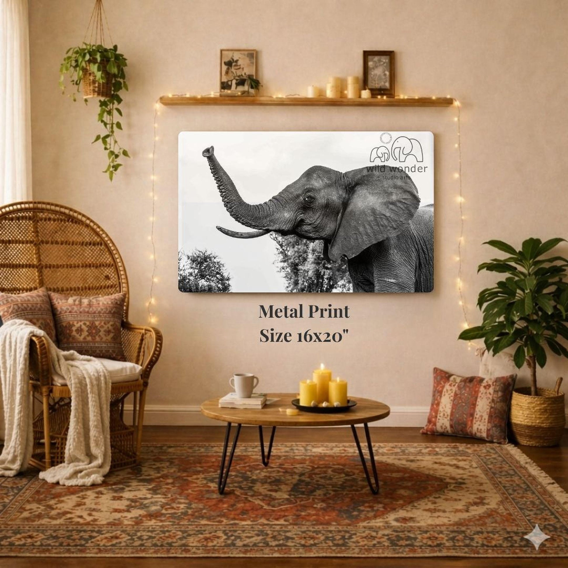 a large metal print of a black and white elephant on a wall, with a wicker chair, a coffee table, and a potted plant in the background.