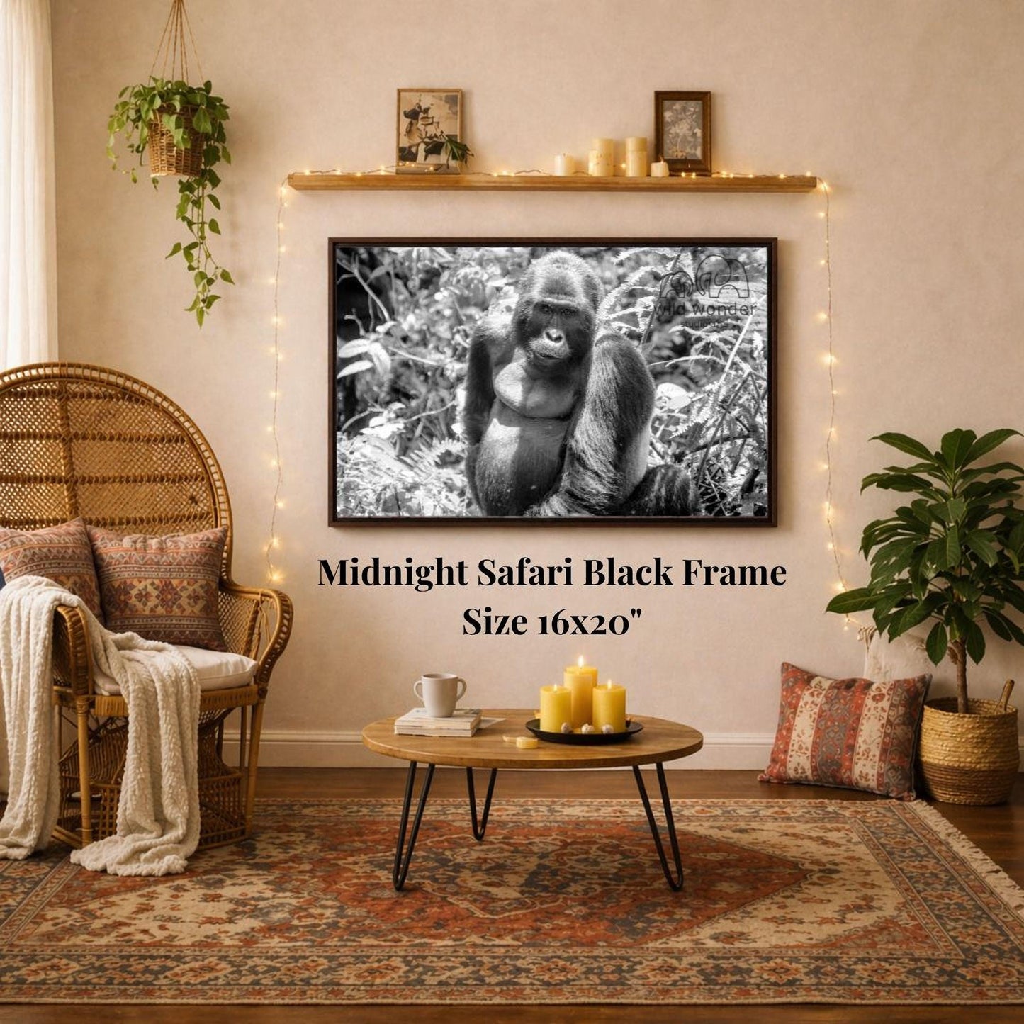 a living room with a large black and white photograph of a gorilla hanging on the wall. The room has a cozy and rustic atmosphere, with a wicker chair, a coffee table, and a potted plant. The photograph is framed in a 16x20" size, and the text "Midnight Safari Black Frame" is displayed below the frame.